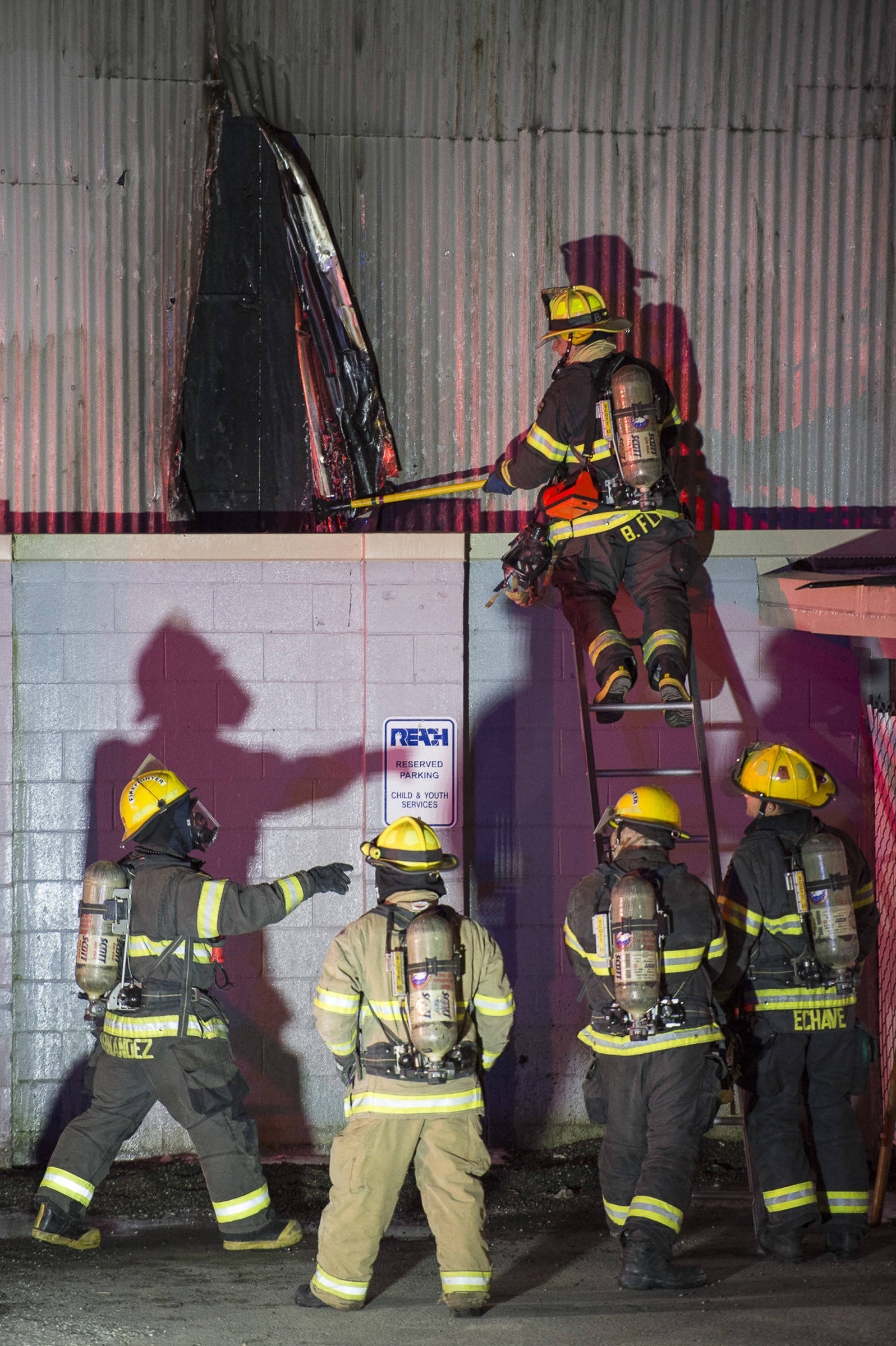 Juneau Capital City Fire/Rescue firefighters work a building fire at North Franklin and Second Street on Monday, April 16, 2017.