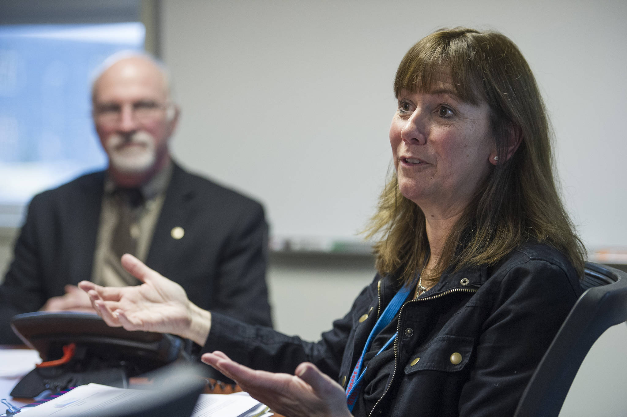 Juneau School District Director of Student Services Bridget Weiss, right, and Superintendent Dr. Mark Miller talk on Thursday, Oct. 19, 2017. (Michael Penn | Juneau Empire File)