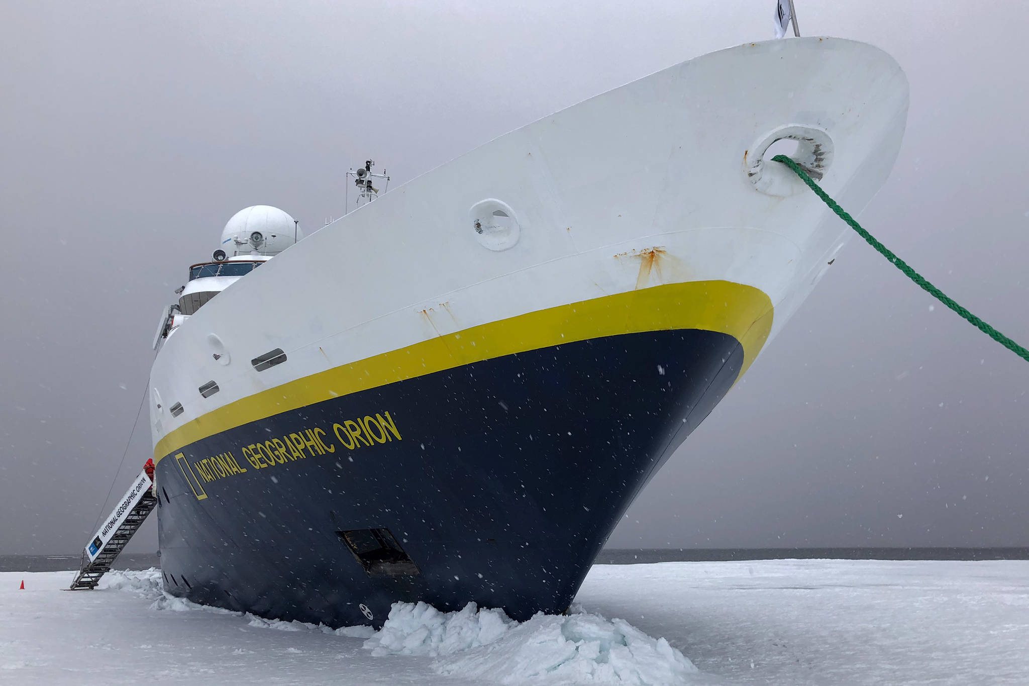 A ship is parked on the ice at Neko Cover on the Antarctica Peninsula during the summer solstice, Dec. 22, 2018. (Courtesy Photo | Jack Kreinheder)