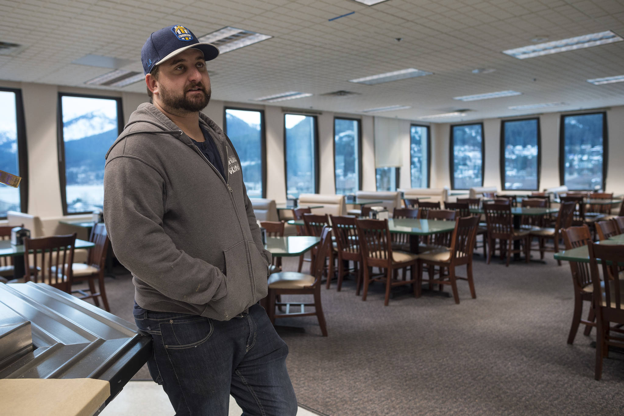 Erik Scholl, who owns cafes at the Hurff Ackerman Saunders Federal Building and the State Office Building, talks Wednesday, Jan. 9, 2019, about having about half the patrons at the Federal Building location since the partial federal shutdown started on Saturday, Dec. 22, 2018. (Michael Penn | Juneau Empire)