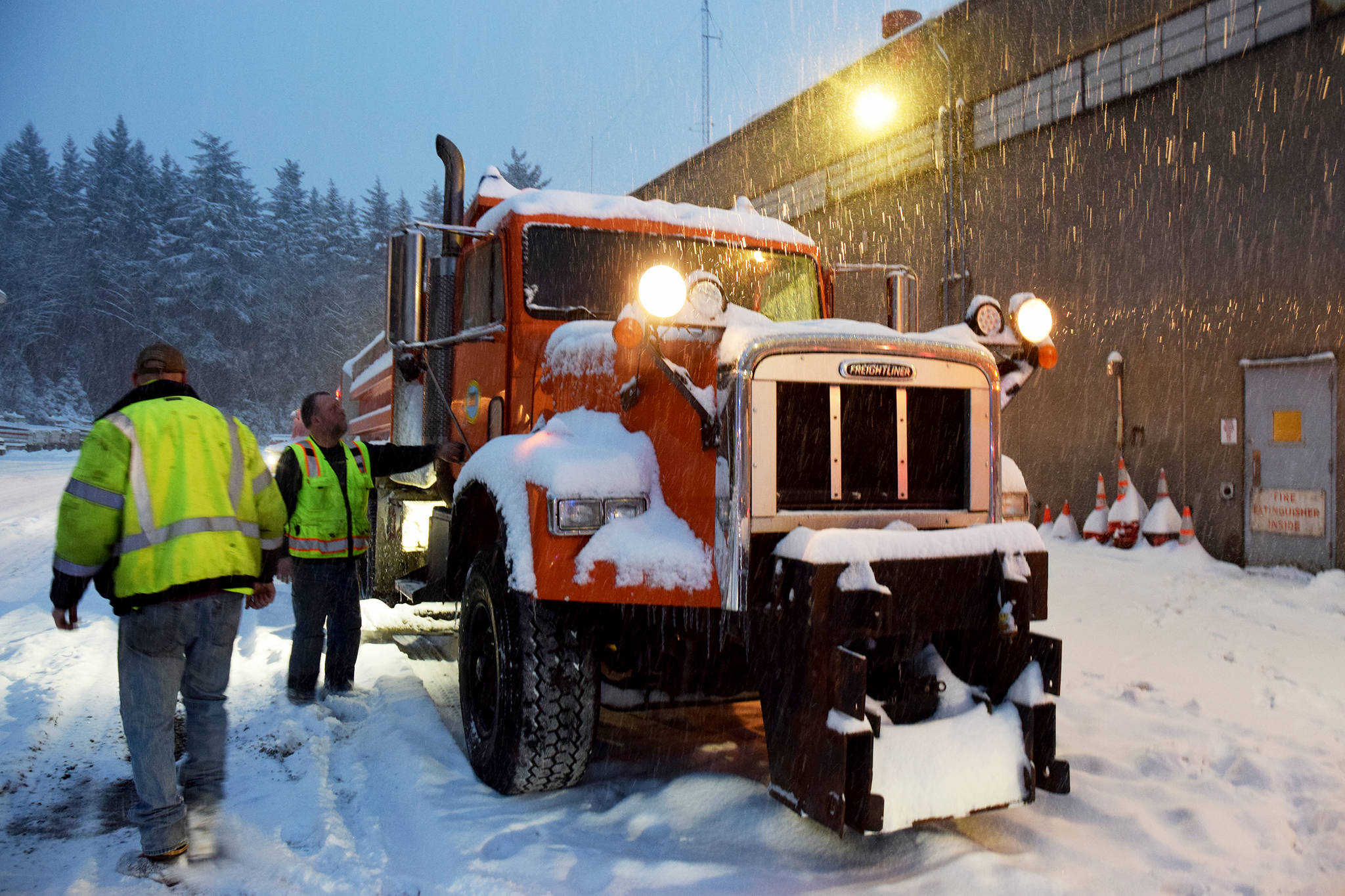 Department of Transportation workers gear up to plow the roads on Thursday Jan. 10. (Mollie Barnes | Juneau Empire)