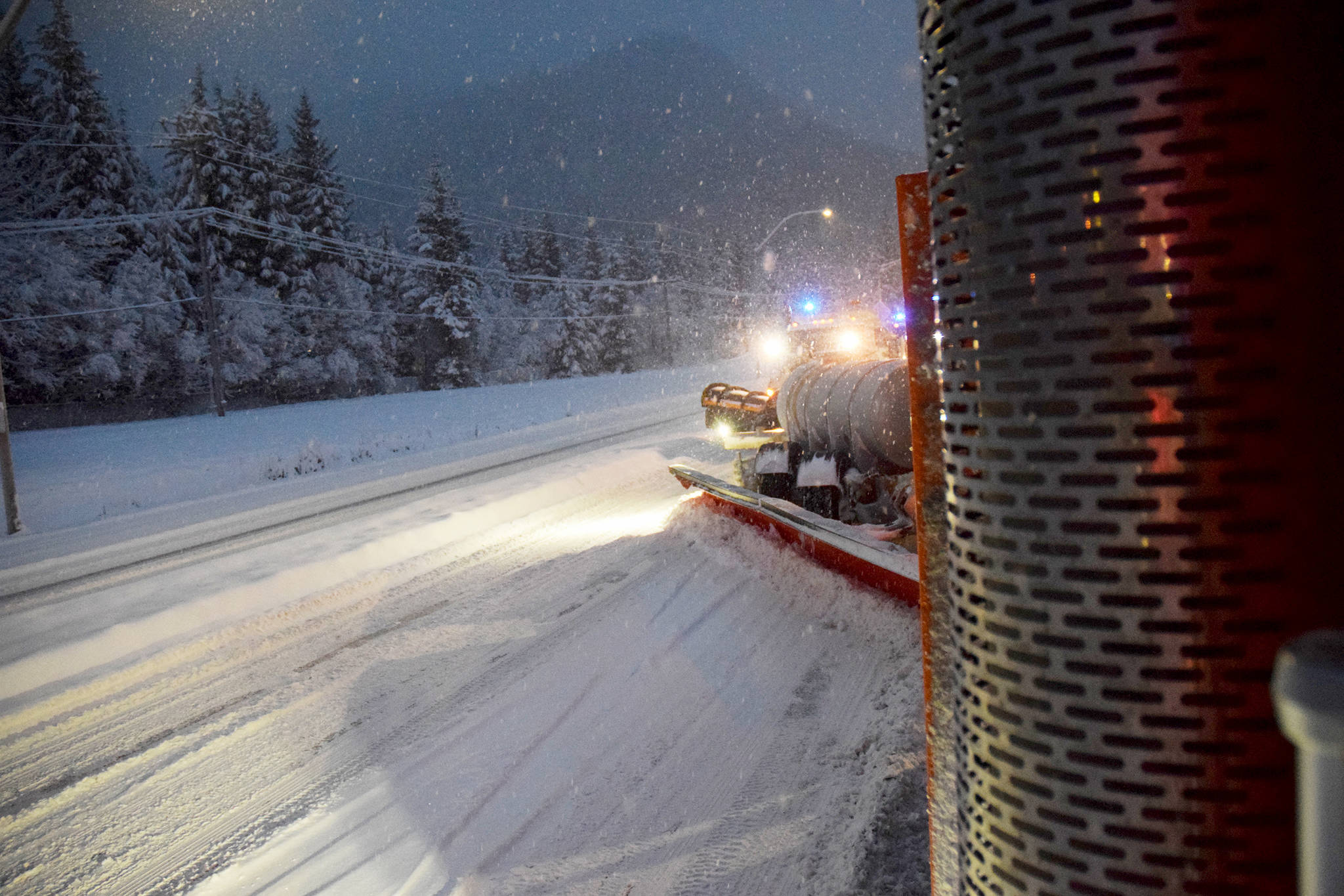 The Department of Transportation and Public Facilities tow plow clears snow from two lanes at once on Thursday Jan. 10. (Mollie Barnes | Juneau Empire)