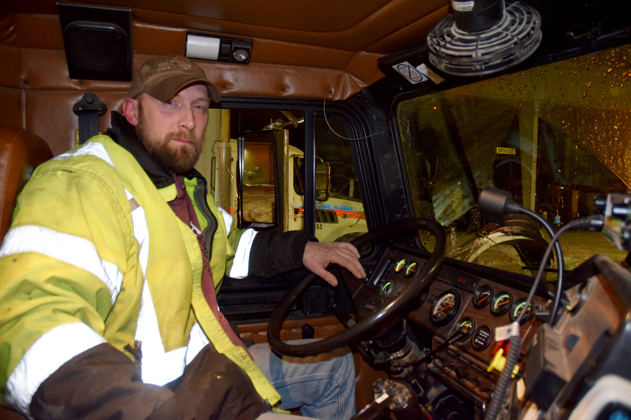Department of Transportation & Public Facilities Systems Operator Spencer Gates drives a tow plow on Thursday Jan. 10. (Mollie Barnes | Juneau Empire)