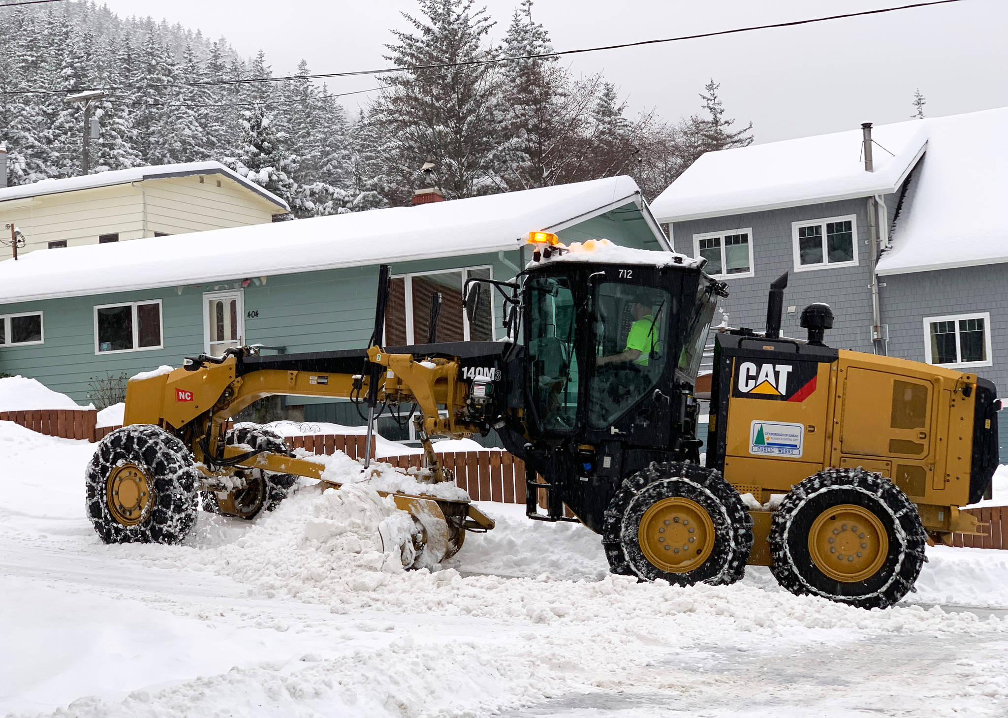 A City and Borough of Juneau Public Works plow clears St. Ann’s Avenue on Douglas on Friday, Jan. 11, 2019. (Angelo Saggiomo | Juneau Empire)