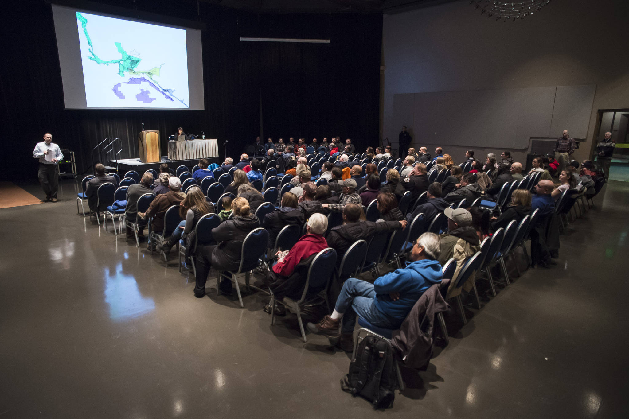 Juneau Police Department Sgt. Sterling Salisbury gives a presentation during an open house on crime in Juneau at Centennial Hall on Thursday, Jan. 10, 2019. The meeting was organized by members of the Public Safety Employees Association. (Michael Penn | Juneau Empire)