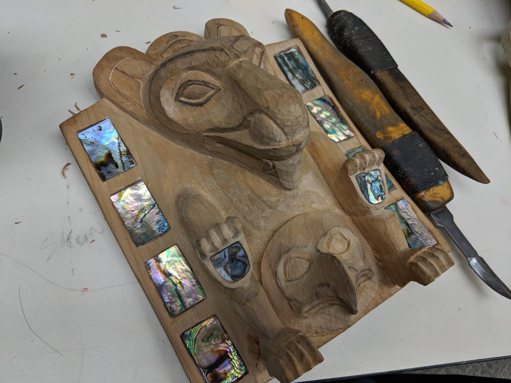 Ray Watkins was working on this frontlet during carving practice Saturday, Jan. 12, 2019. (Ben Hohenstatt | Capital City Weekly)