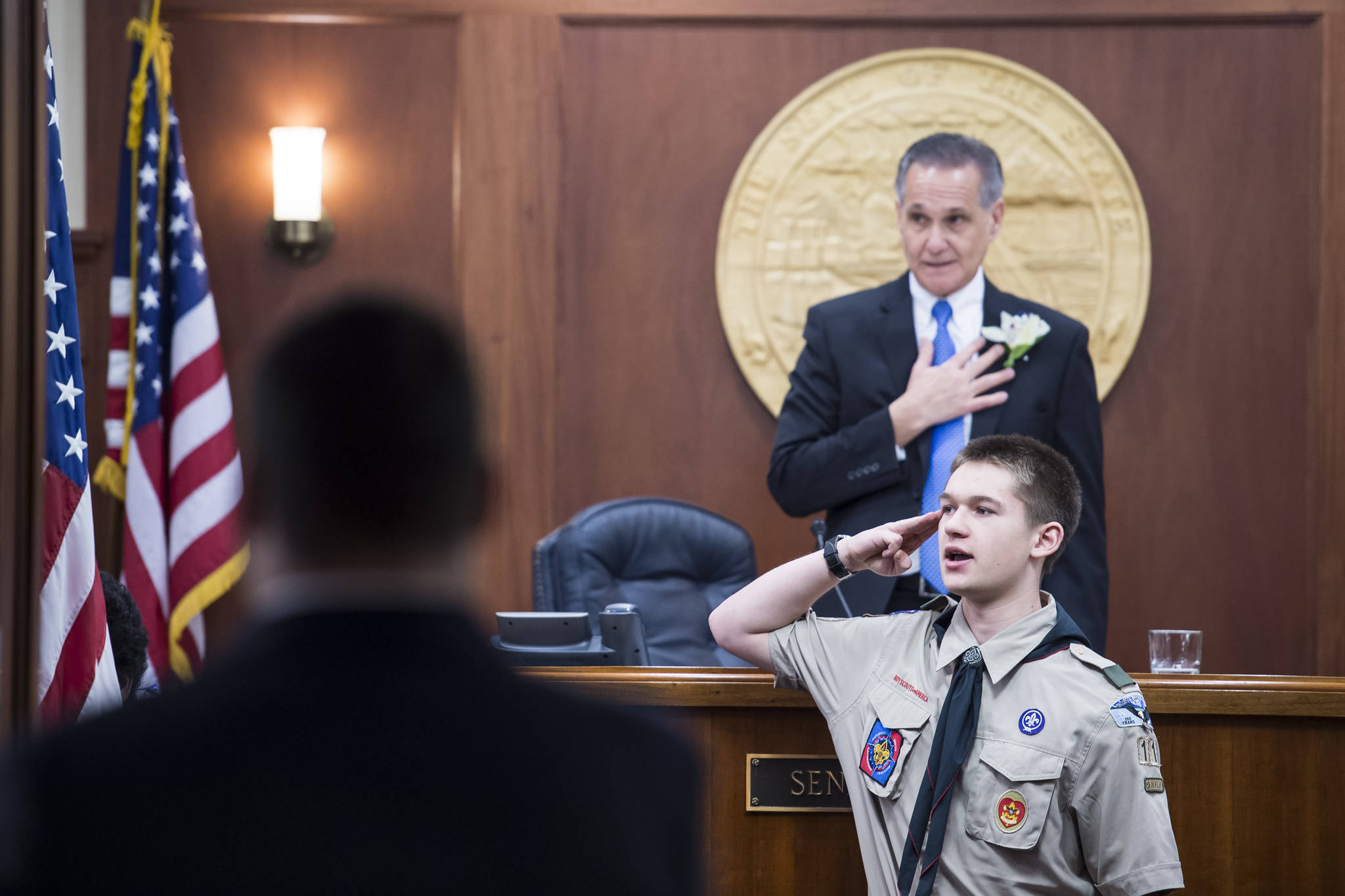 Boy Scout Orion Swanson leads the Pledge of Allegiance of the United States on the opening day of the 31st Session of the Alaska Legislature on Tuesday, Jan. 15, 2019. (Michael Penn | Juneau Empire)