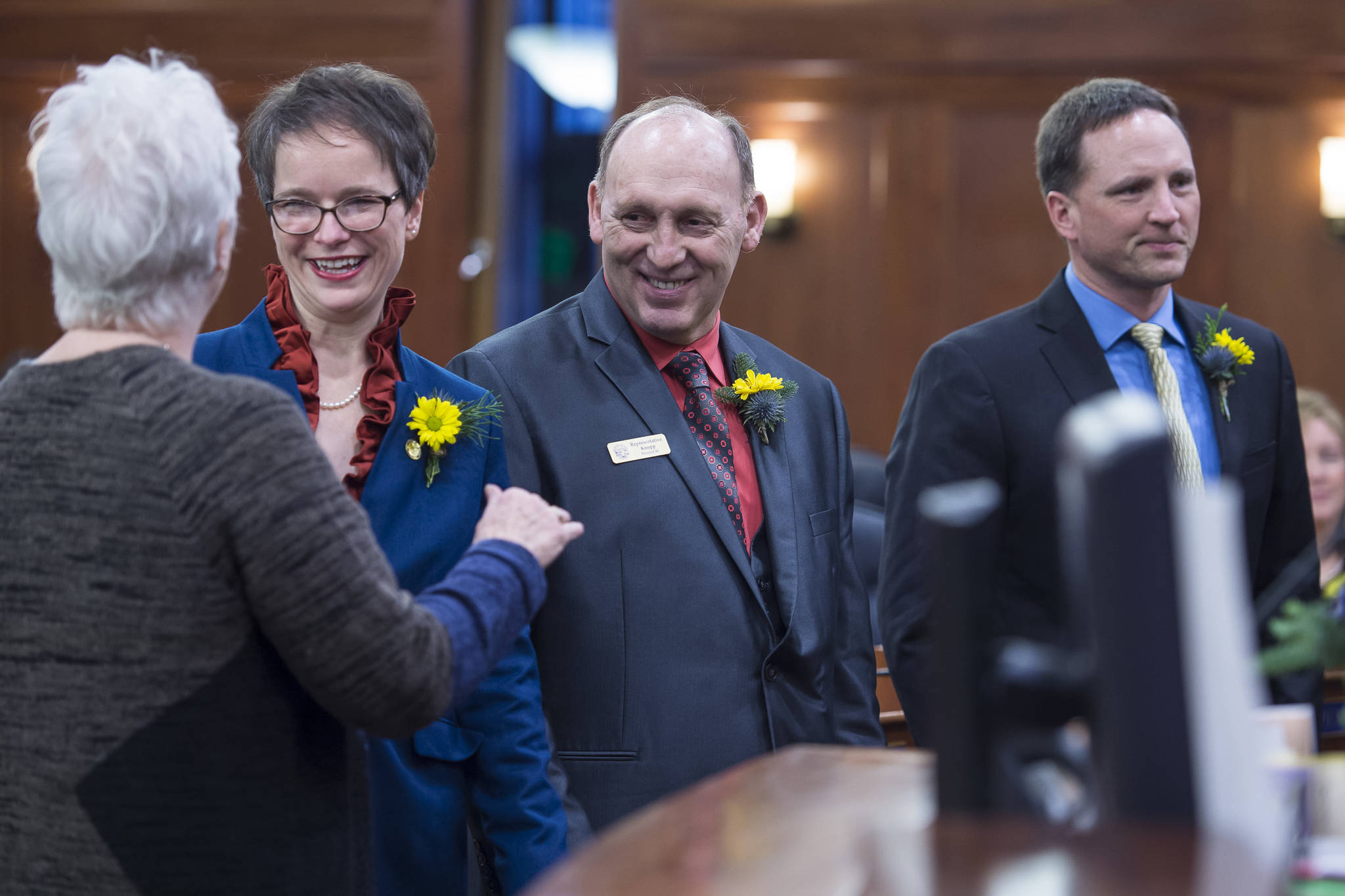 Rep. Louise Stutes, R-Kodiak, left, congratulates Rep. Sarah Vance, R-Homer, Rep. Gary Knopp, R-Kenai, and Rep. Ben Carpenter, R-Nikiski, right, after being sworn in on the opening day of the 31st Session of the Alaska Legislature on Tuesday, Jan. 15, 2019. (Michael Penn | Juneau Empire)