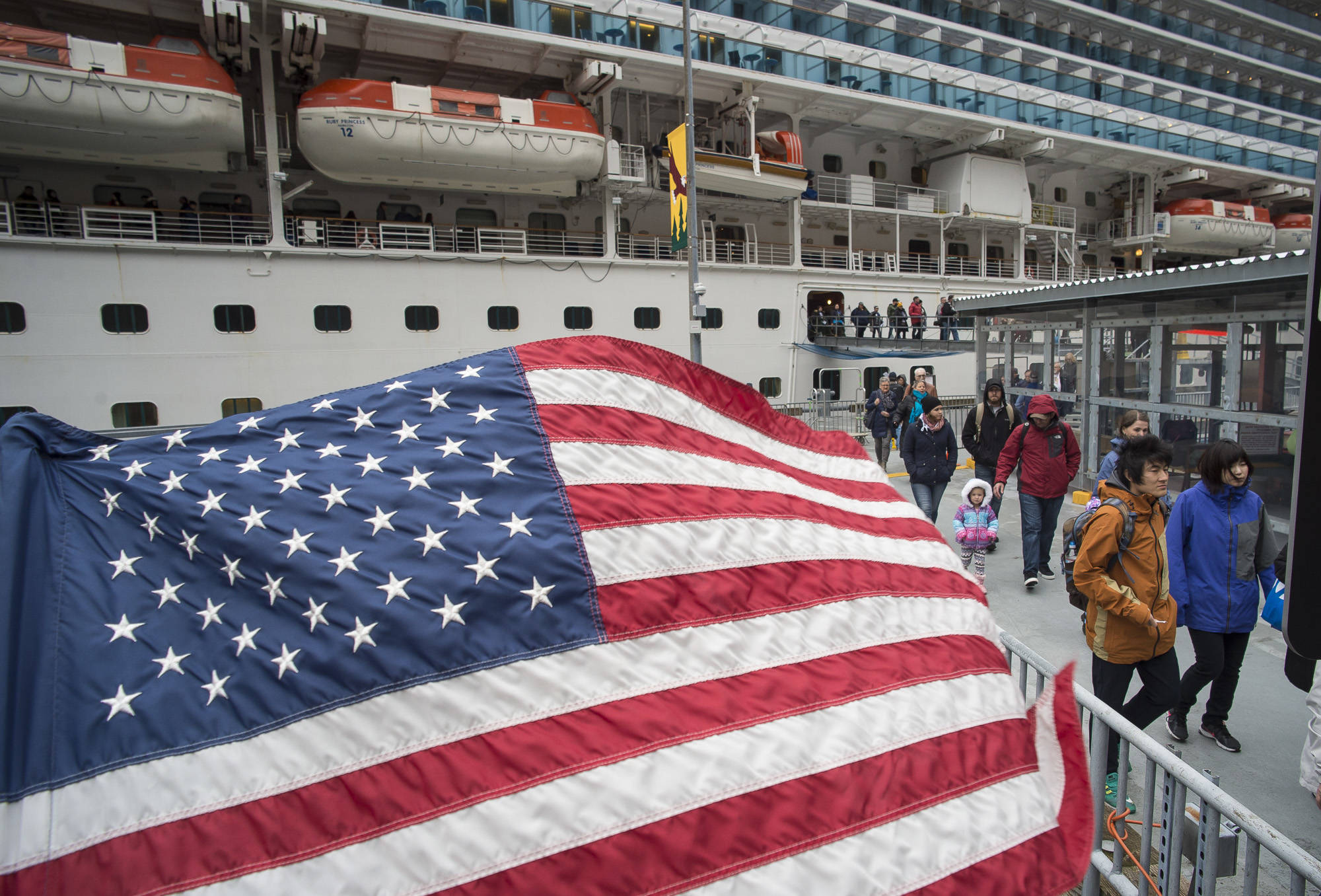 The Ruby Princess is escorted by the U.S. Coast Guard into the Juneau downtown harbor on April 30, 2018. (Michael Penn | Juneau Empire File)