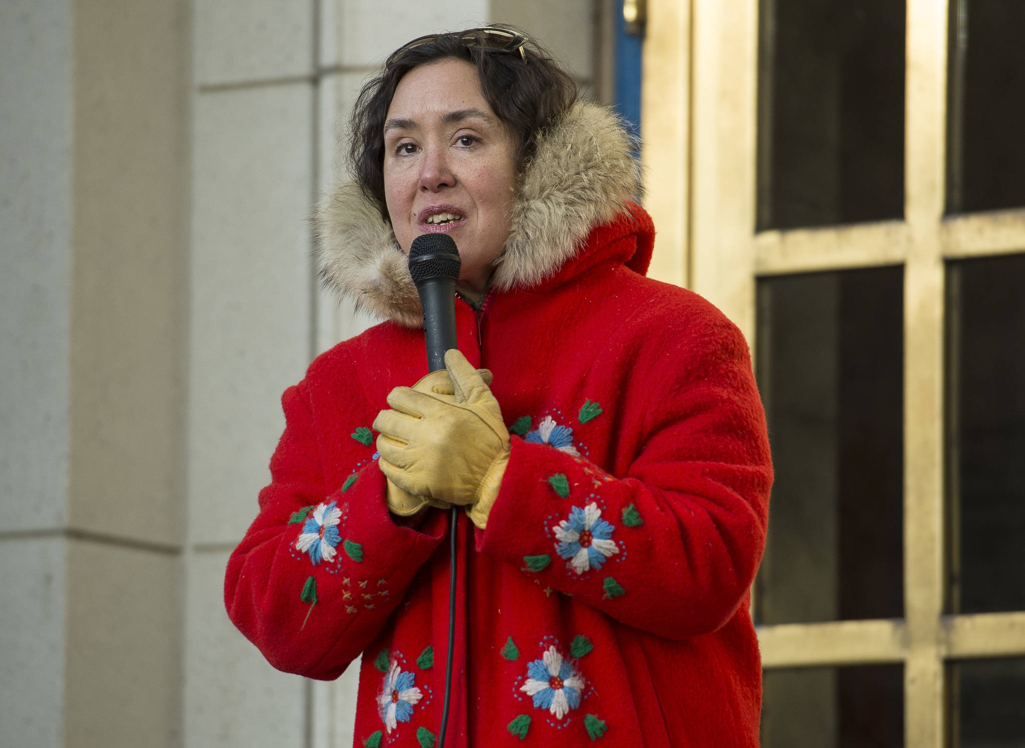 Melanie Brown speaks at the Women’s March on Juneau in front of the Alaska State Capitol on Saturday, Jan. 19, 2019. (Michael Penn | Juneau Empire)