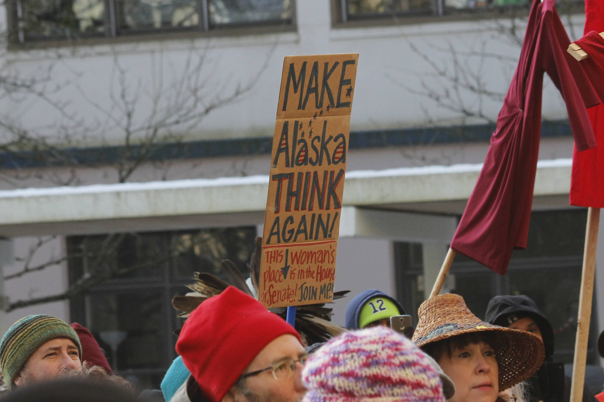 Attendees hold up signs at Juneau’s Women’s March on Saturday, Jan. 19, 2019. (Alex McCarthy | Juneau Empire)