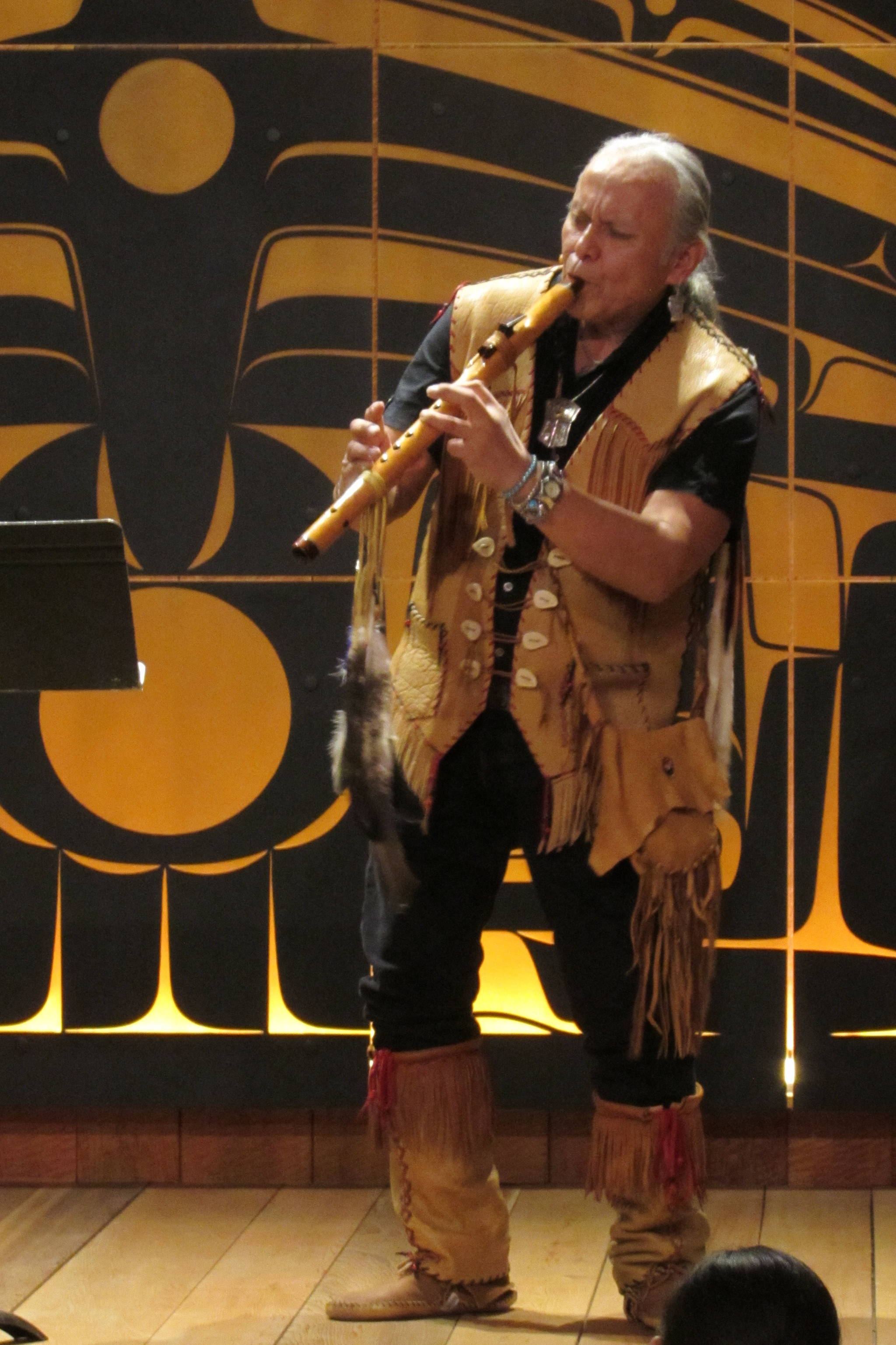 Tlingit flautist George Montero performs to open the Shuká Hít Series: Flutes From Around the World concert, Saturday, Jan. 19, 2019. (Ben Hohenstatt | Capital City Weekly)