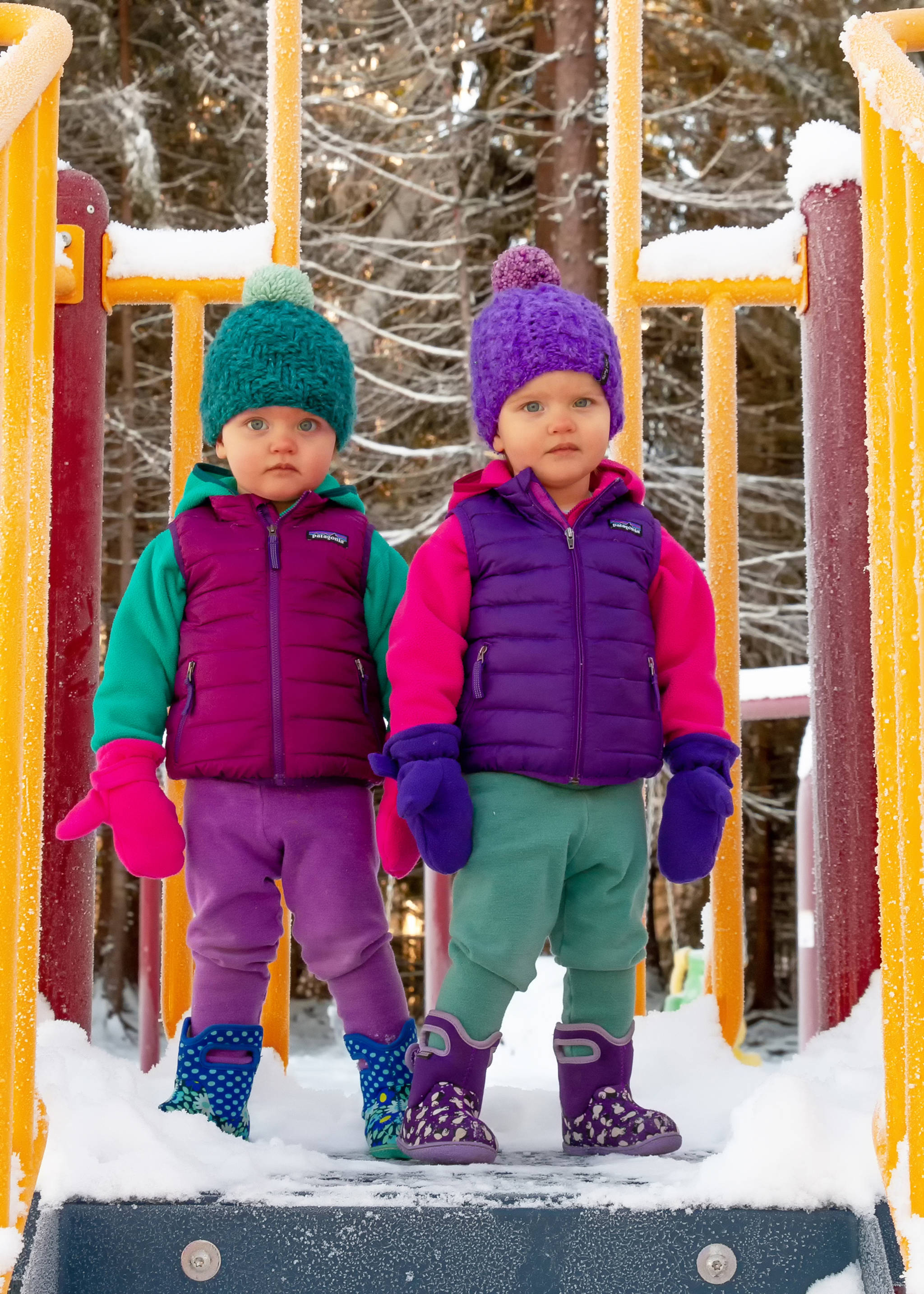 Feb. 24, 2019: Remember the old slogan, “Double your pleasure, double your fun?” Well it doesn’t get much cuter or more fun than identical twins Elise and Claire Beason, spotted at Rotary Park in their coordinated and oh so hip outfits! For this outing, the girls sported matching colors in their wool pants from Wild Coconut, fleece jackets and vests from Patagonia, boots from Bogs, and locally knit hats from WWKnits. Warm, wide-eyed and adorable!