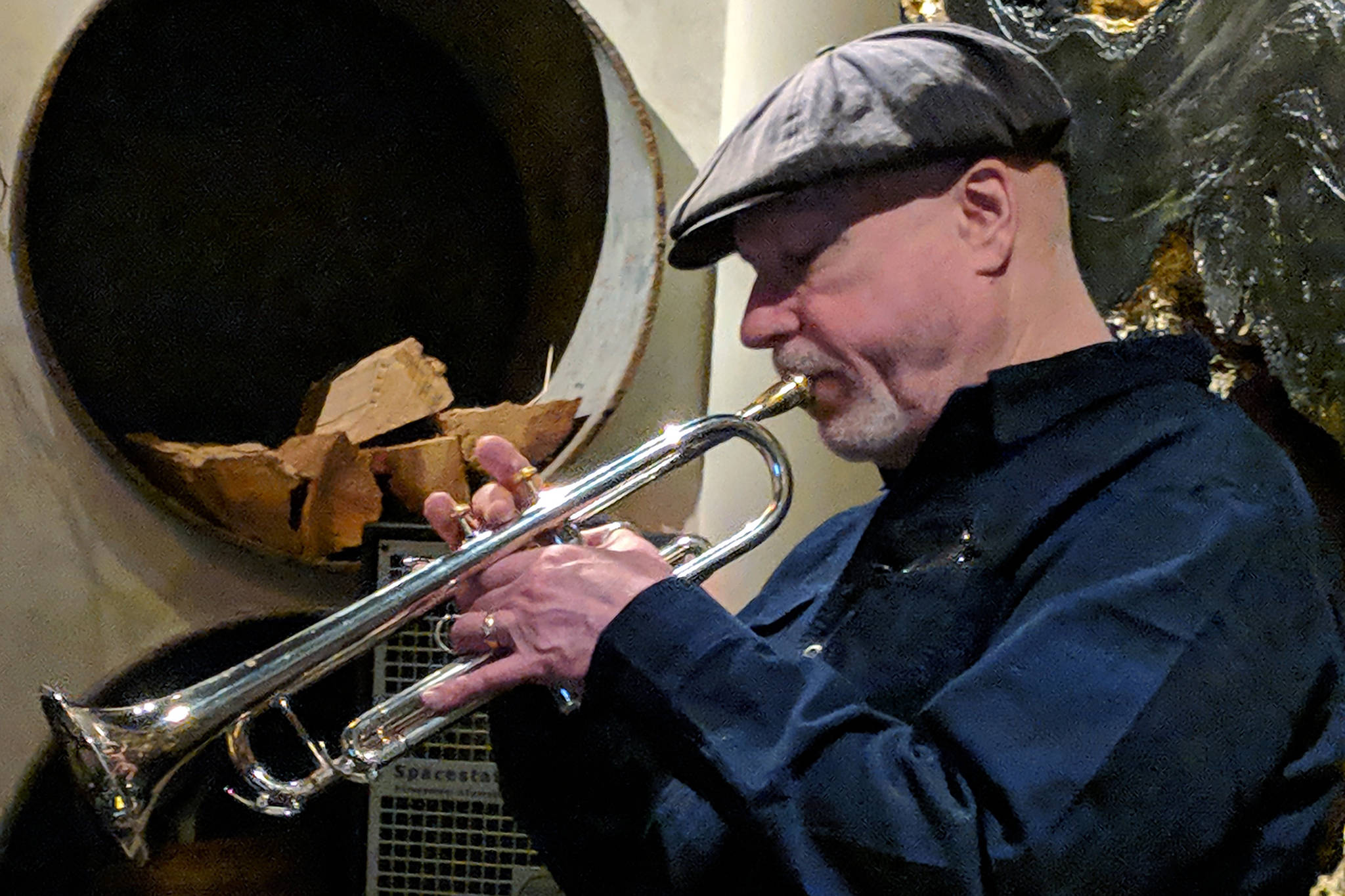 Greg Kalbaugh plays trumpet during the Juneau Five’s regular Thursday Night Jazz show at the Narrows Bar, Jan. 31, 2019. (Ben Hohenstatt | Juneau Empire)