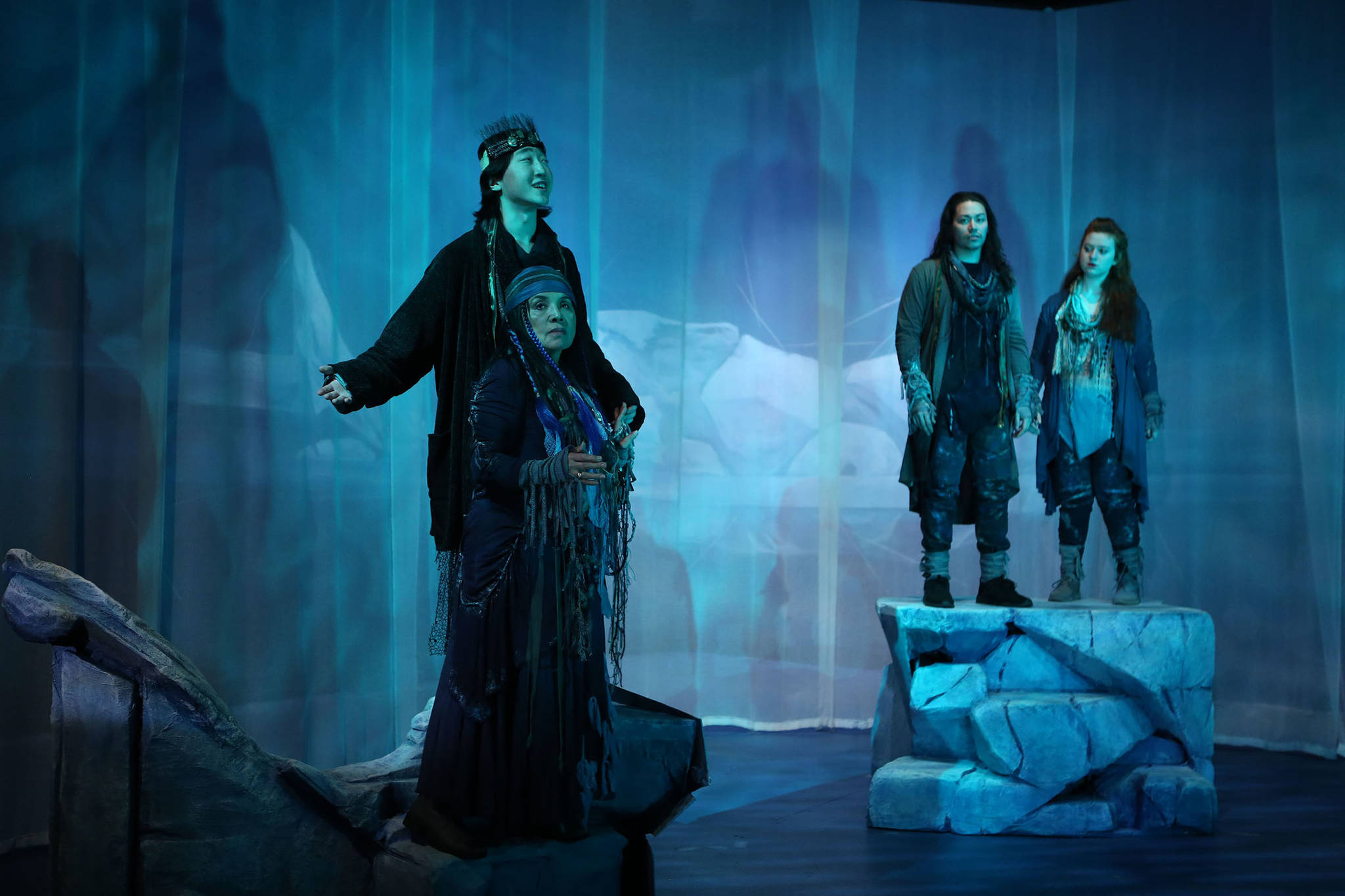 Tai Yen Kim as Agviq, Jane Lind as Whale Priestess, Ty Yamaoka as Nukaaluk and Ashleigh Watt as Nayak contemplate what’s to be done in “Whale Song.” (Courtesy Photo | Brian Wallace for Perseverance Theatre)