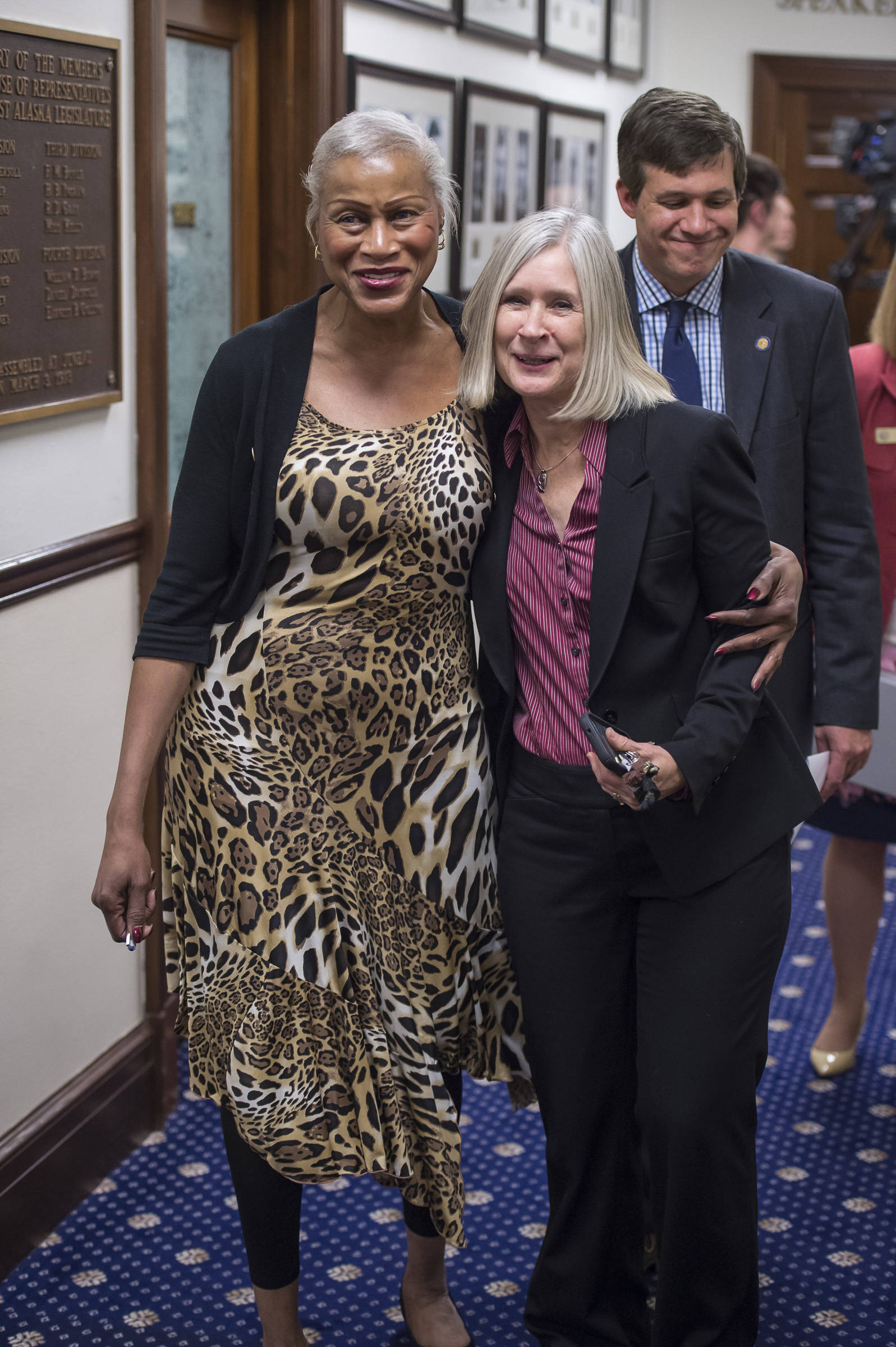 Sen. Elvi Gray-Jackson, D-Anchorage, Rep. Andi Story, D-Juneau, and Sen. Bill Wielechowski, D-Anchorage, arrive to listen to Gov. Mike Dunleavy give his State of the State speech at the Capitol on Tuesday, Jan. 22, 2019. (Michael Penn | Juneau Empire)