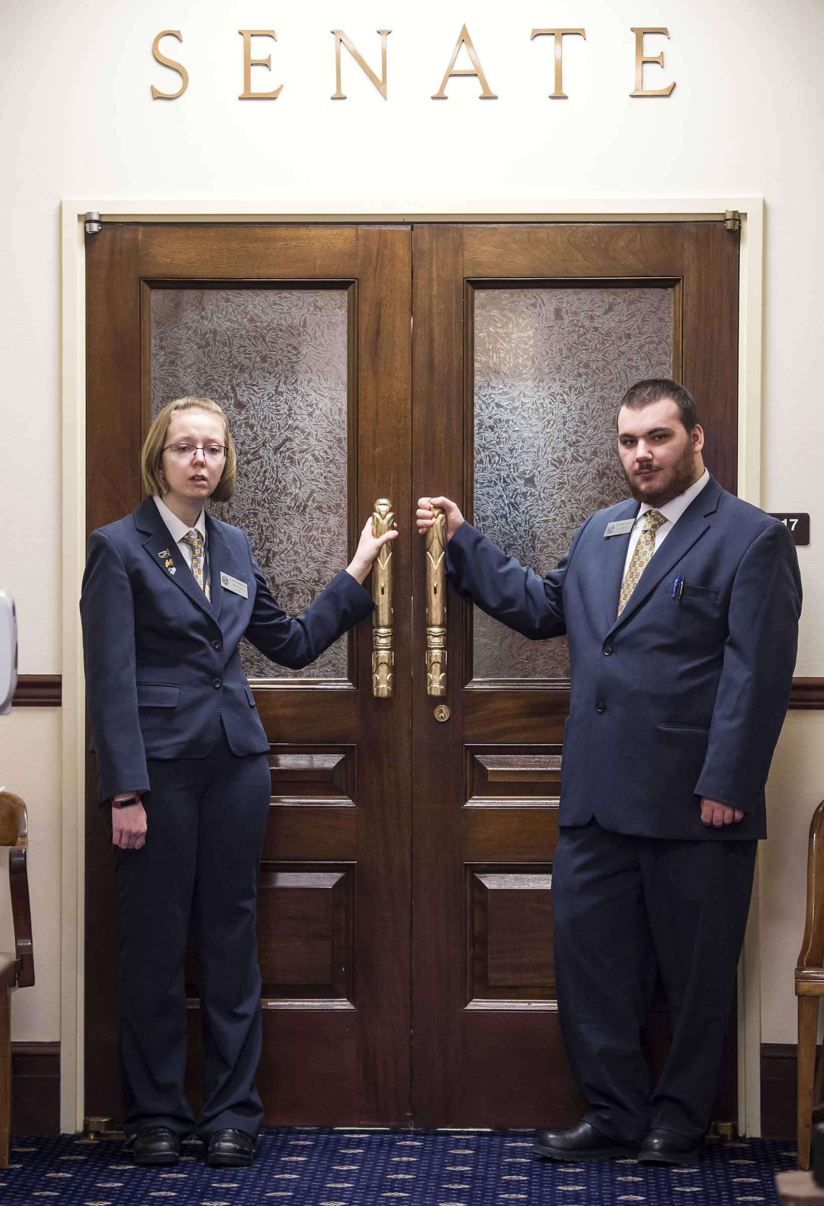 Senate Pages Sydney Krebsbach, left, and Matthew Puckett dressed for work at the Capitol on Wednesday, Jan. 23, 2019. (Michael Penn | Juneau Empire)