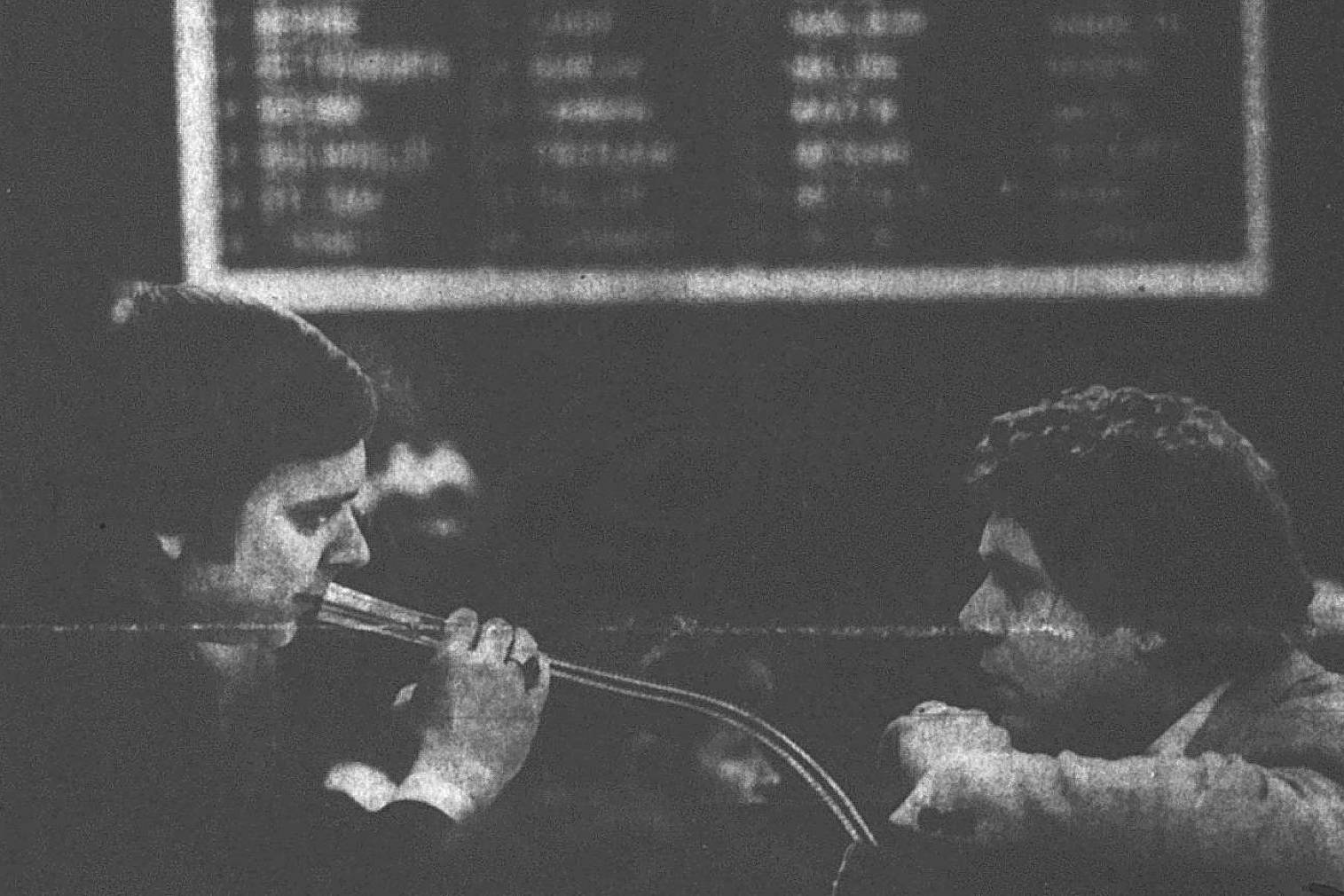 House Speaker Jim Duncan, D-Juneau, confers with Majority Leader Russ Meekins on Feb. 3, 1981, after the 22-day gridlock over House organization was broken late the previous afternoon following a series of parliamentary maneuvers. (Mark Kelley | Juneau Empire File)