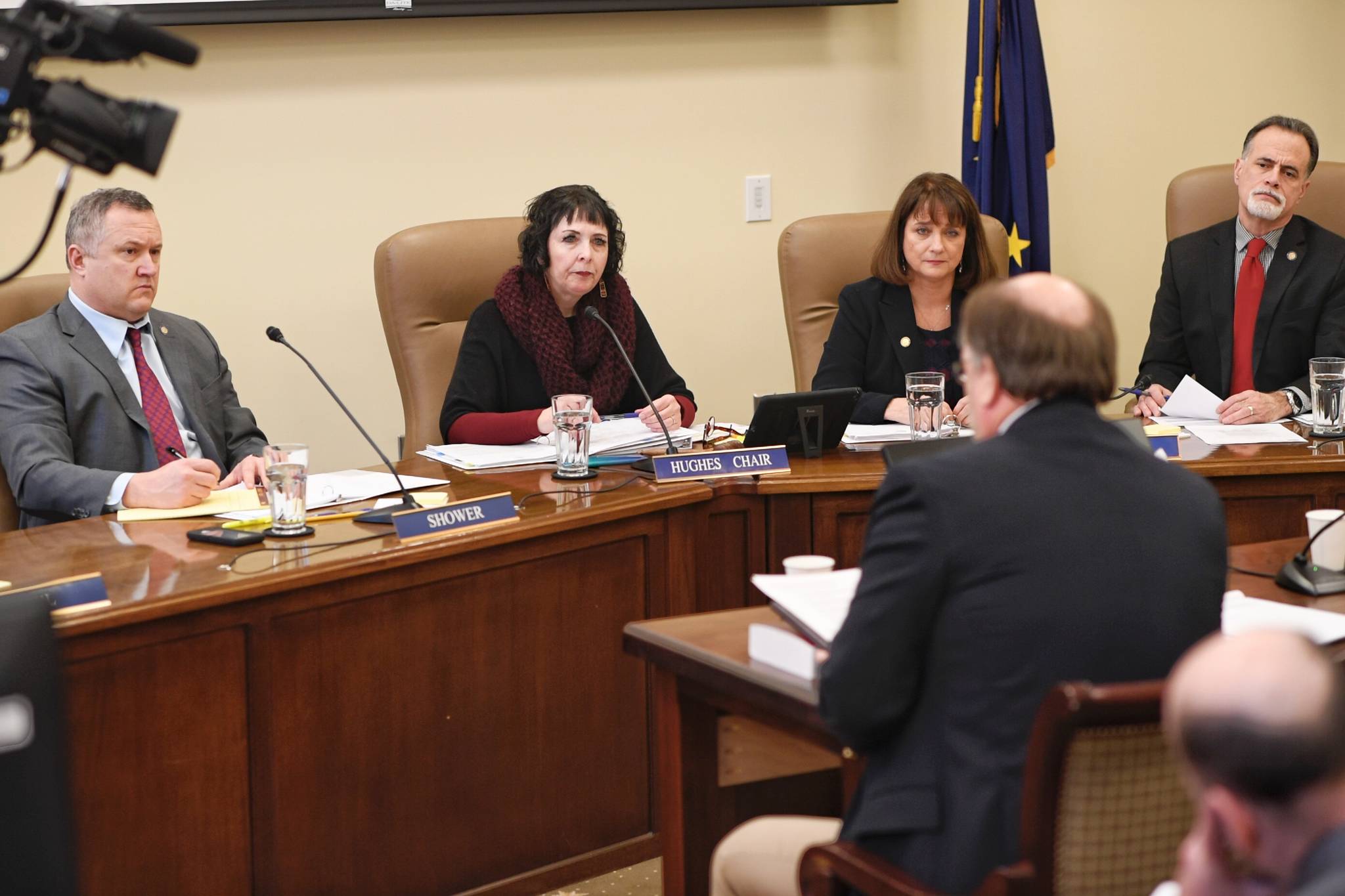 Members of the Senate Judiciary Committee, Sen. Mike Shower, R-Wasilla, left, Sen. Shelley Hughes, R-Wasilla, Sen. Lora Reinbold, R-Eagle River, and Sen. Peter Micciche, R-Soldotna, right, listen Attorney General Kevin Clarkson speak about Gov. Mike Dunleavy’s dour crime bills at the Capitol on Wednesday, Feb. 6, 2019. (Michael Penn | Juneau Empire)