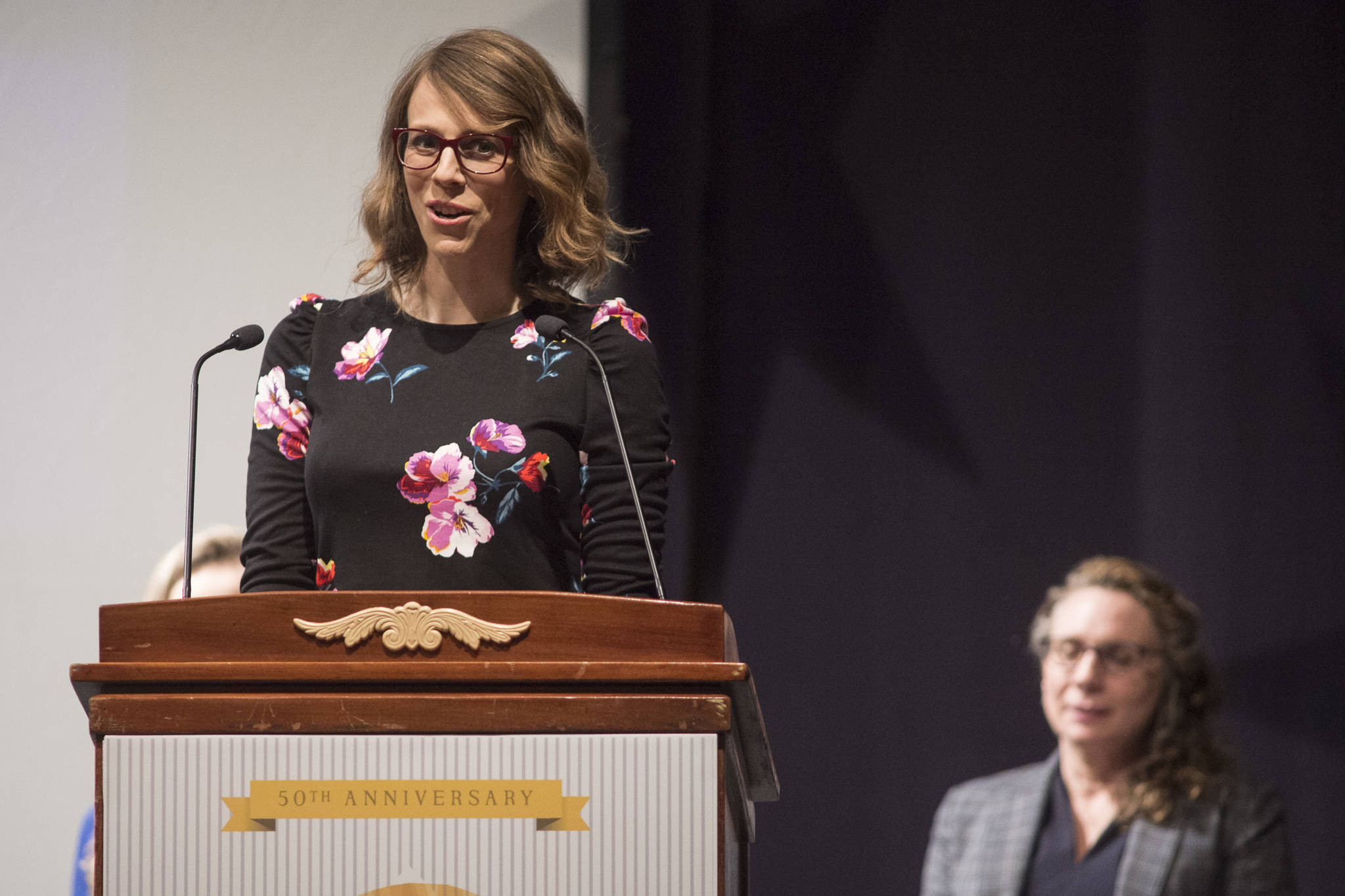 Linnea Hollingsworth accepts the Lifetime Achievement in the Arts Award for her grandmother, Dot Bardarson, of Seward, at the 2019 Governor’s Arts and Humanities Awards at the Juneau Arts & Culture Center on Thursday, Feb. 7, 2019. (Michael Penn | Juneau Empire)