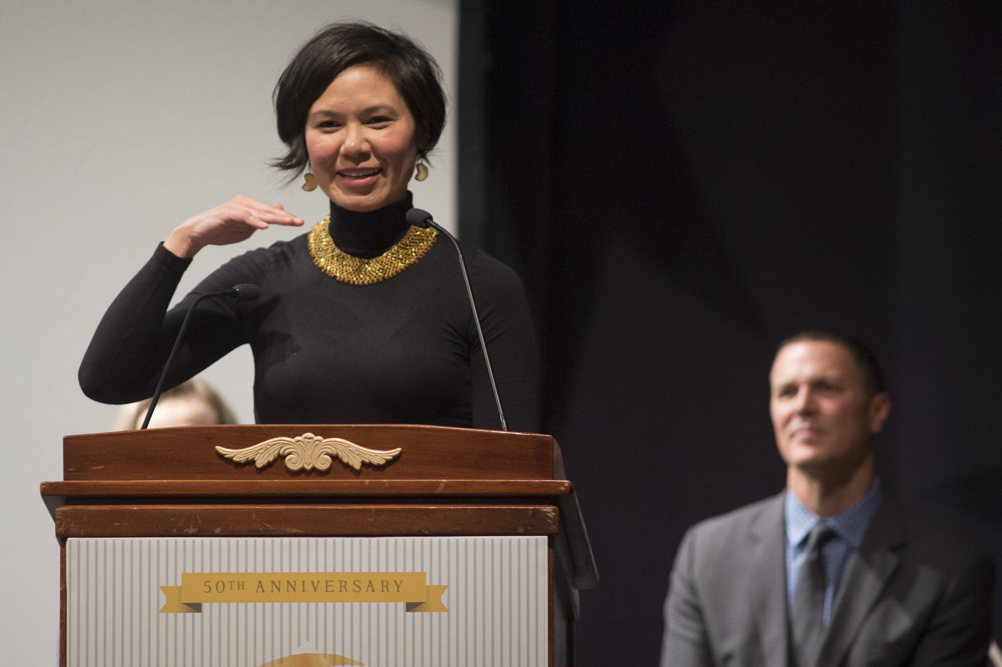 Laureli Ivanoff, of Unalakleet, receives her Distinguished Service to the Humanities Award for Leadership at the 2019 Governor’s Arts and Humanities Awards at the Juneau Arts & Culture Center on Thursday, Feb. 7, 2019. (Michael Penn | Juneau Empire)