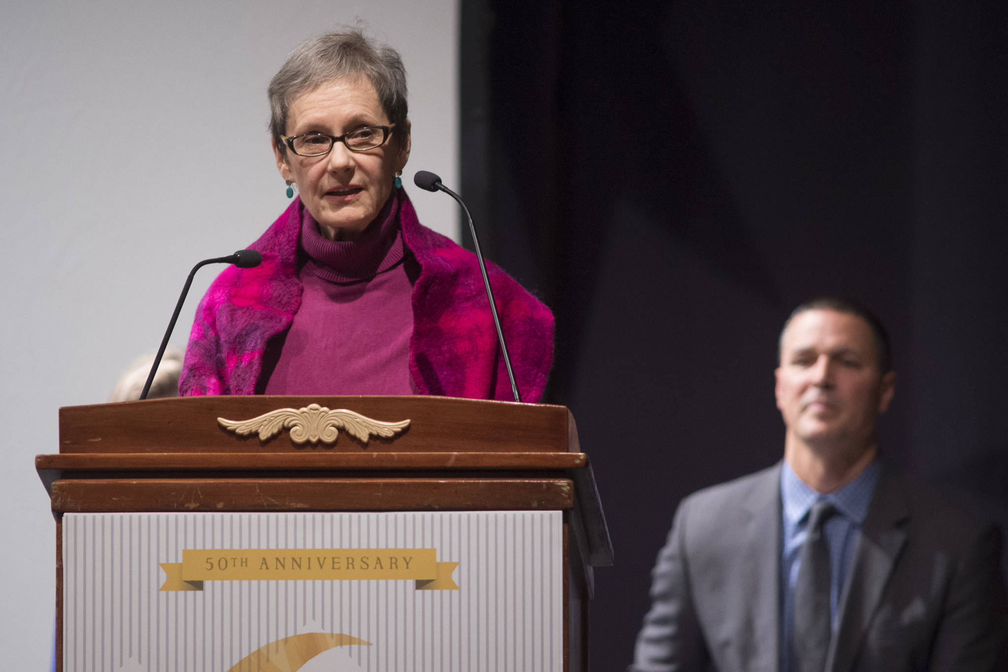 Bede Trantina, of Anchorage, receives her Distinguished Service to the Humanities Award for community at the 2019 Governor’s Arts and Humanities Awards at the Juneau Arts & Culture Center on Thursday, Feb. 7, 2019. (Michael Penn | Juneau Empire)