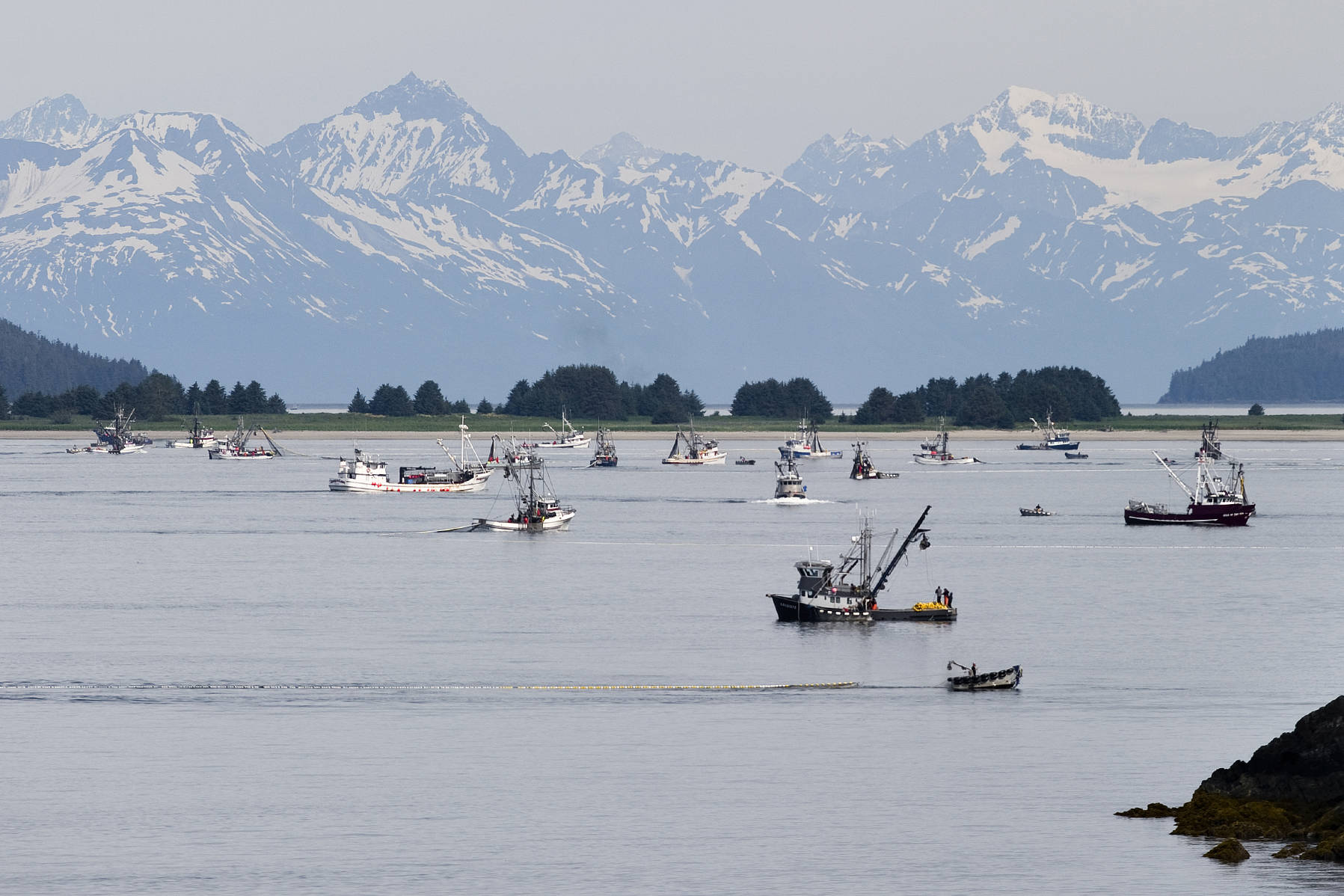 Purse seiners work the waters for salmon near Amalga Harbor in Favorite Channel during an opening in July 2012. (Michael Penn | Juneau Empire File)