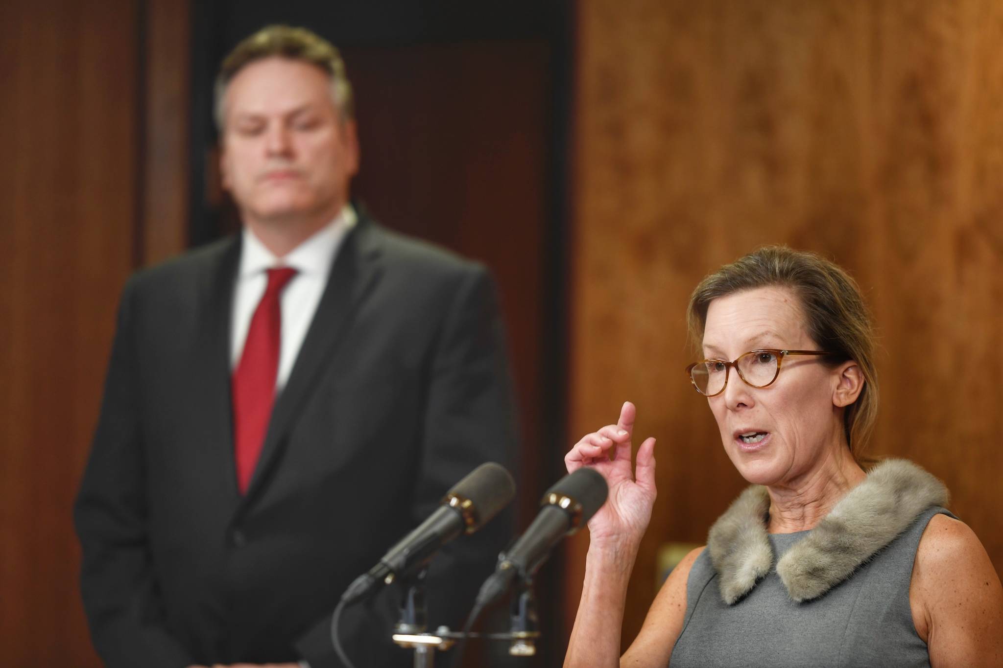 OMB Director Donna Arduin explains the budget as Gov. Mike Dunleavy listens during a press conference to announce the state’s budget on Wednesday, Feb. 13, 2019. (Michael Penn | Juneau Empire)