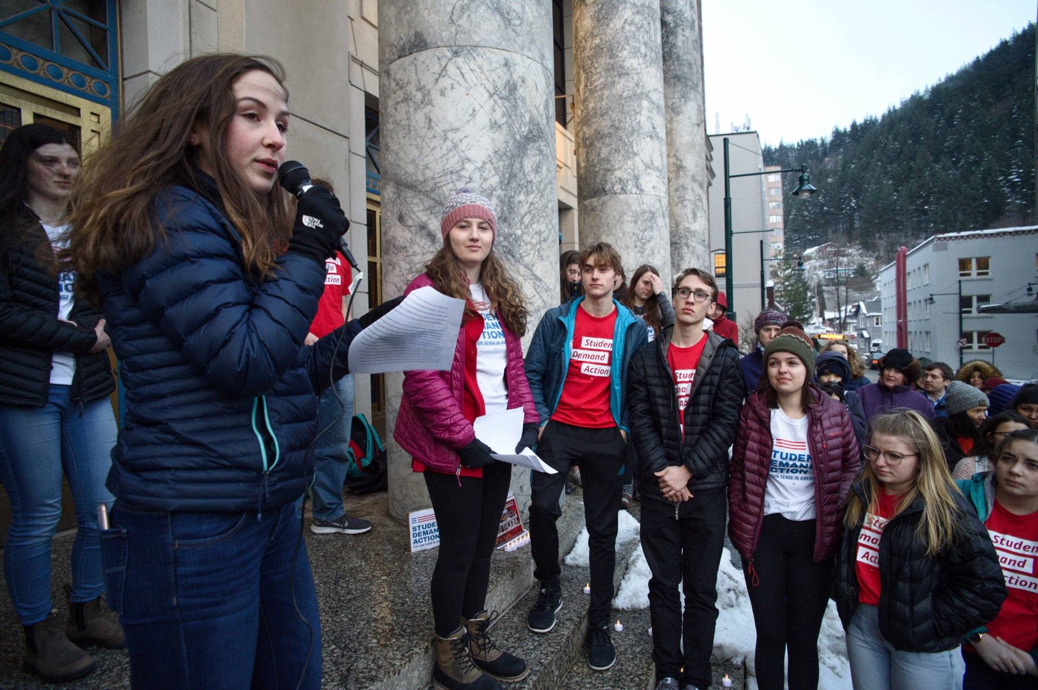 Katie McKenna, a junior at Juneau-Douglas High School, speaks against gun violence at a vigil for the victims of the shooting last year in Parkland, Florida, held at the Capitol on Thursday, Feb. 14, 2019 on the one-year anniversary of the shooting at Marjory Stoneman Douglas High School. (Michael Penn | Juneau Empire)
