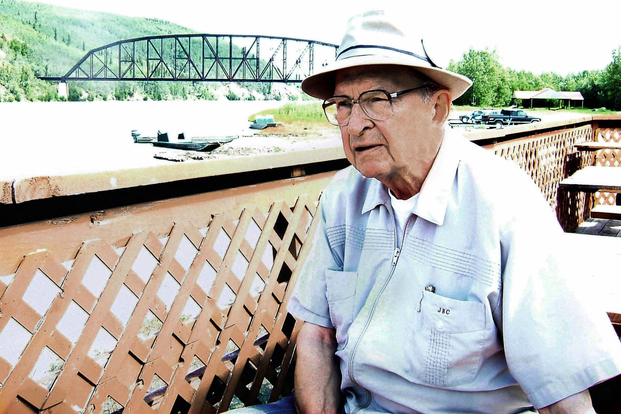 In this June 16, 2005 photo, Jack Coghill sits by the Tanana River in Nenana, Alaska. One of the last remaining members of the Alaska constitutional convention, former Lt. Gov. Jack Coghill died Wednesday, Feb. 13, 2019, at age 93 in North Pole. (Dan Joling | Associated Press File)