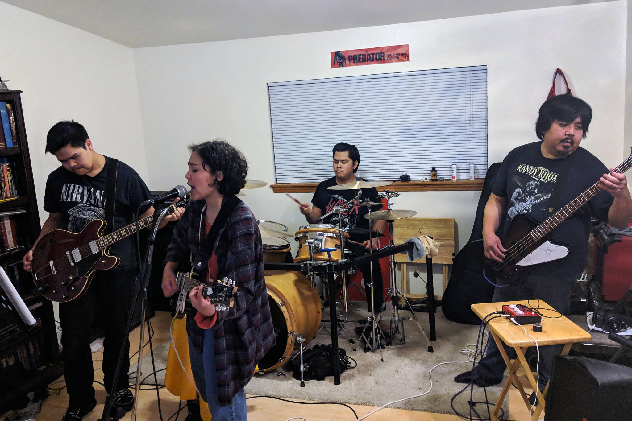 Garden of Agony plays in the Friday family’s living room on Wednesday, Feb. 13, 2019. (Ben Hohenenstatt | Capital City Weekly)