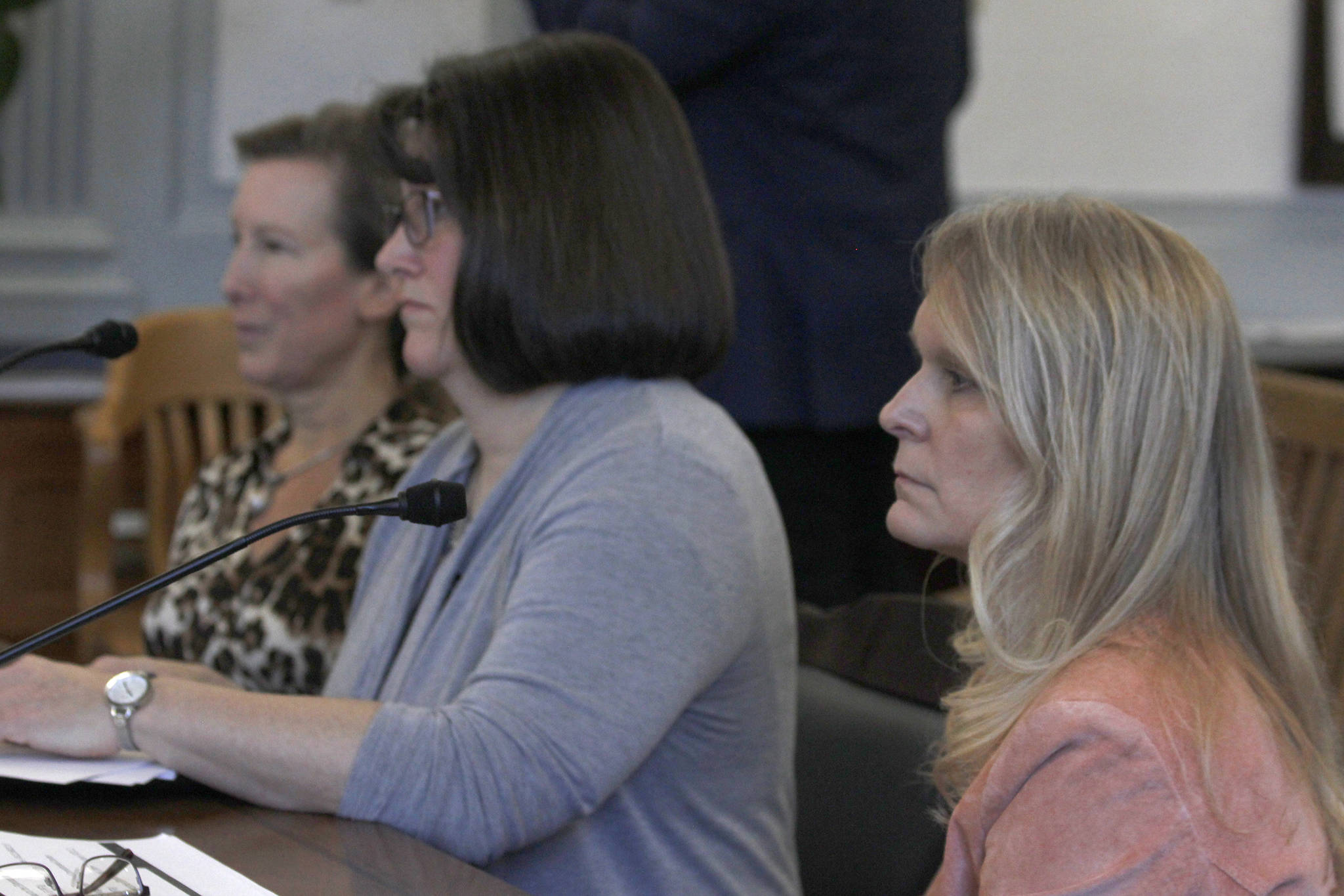 Kelly Goode, right, deputy commissioner for the Department of Corrections, sits alongside DOC Administrative Services Director Sylvan Robb, center, and Office of Management and Budget Director Donna Arduin as they present to the Senate Finance Committee on Friday, Feb. 15, 2019. (Alex McCarthy | Juneau Empire)