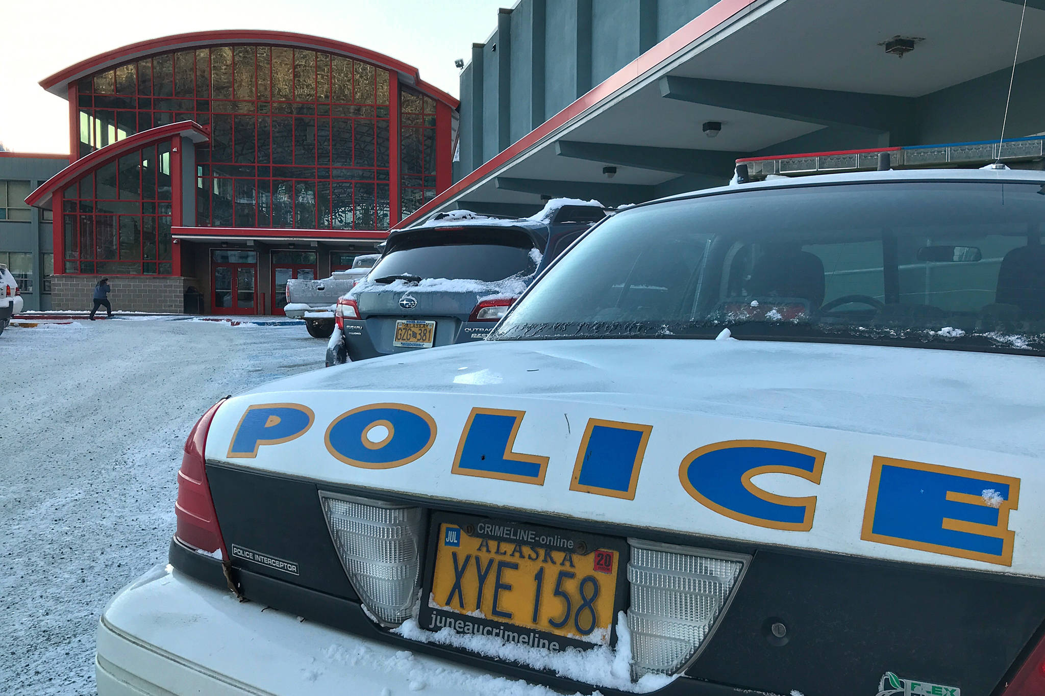 A Juneau Police Department car sits in front of Juneau-Douglas High School on Tuesday, Jan. 8, 2019. (Michael Penn | Juneau Empire)