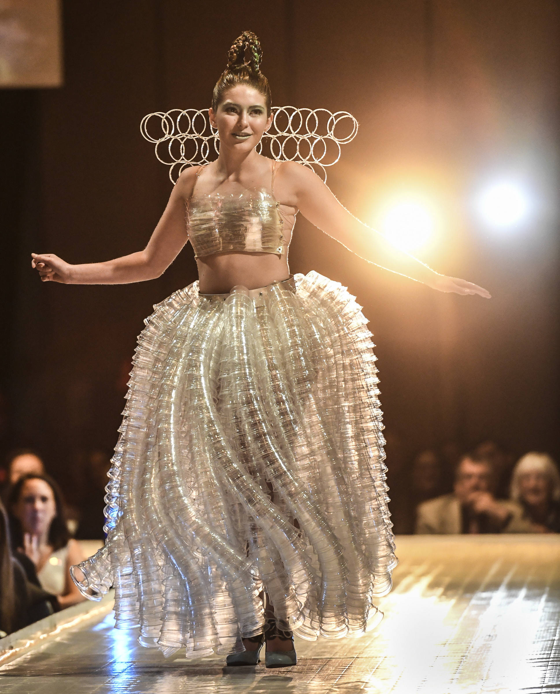 Olivia Moore models her and Karen Smith’s “Plastic Resuscitation” during the Wearable Art Show at Centennial Hall on Saturday, Feb. 16, 2019. (Michael Penn | Capital City Weekly)