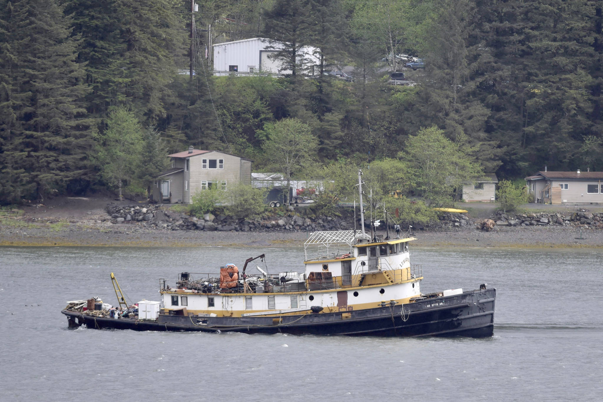 The tugboat Lumberman is seen aground in Gastineau Channel on Monday, May 21, 2018. (Michael Penn | Juneau Empire File)