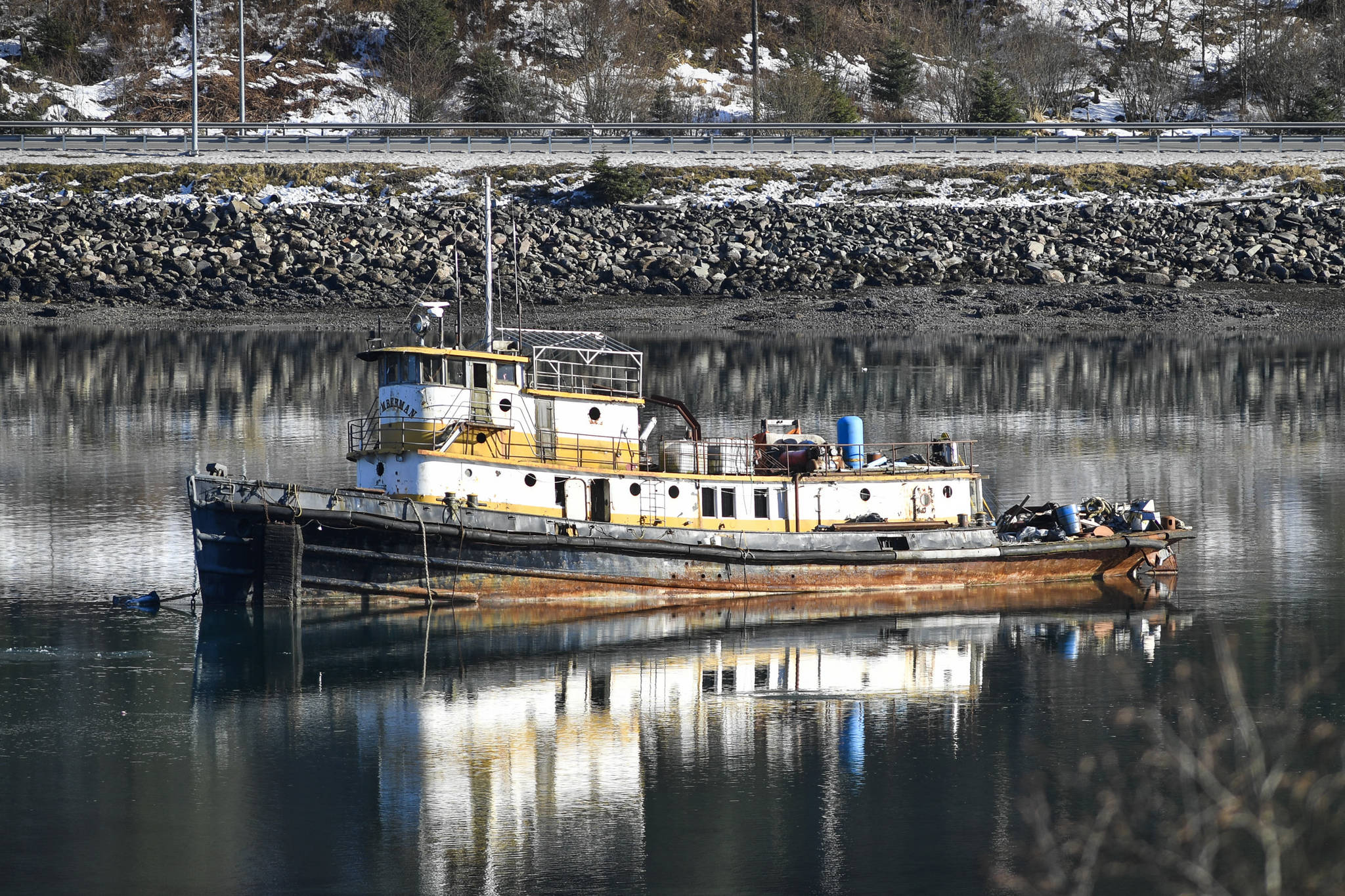 The derelict tug, the Lumberman, at anchor in Gastineau Channel on Tuesday, Feb. 26, 2019. (Michael Penn | Juneau Empire)