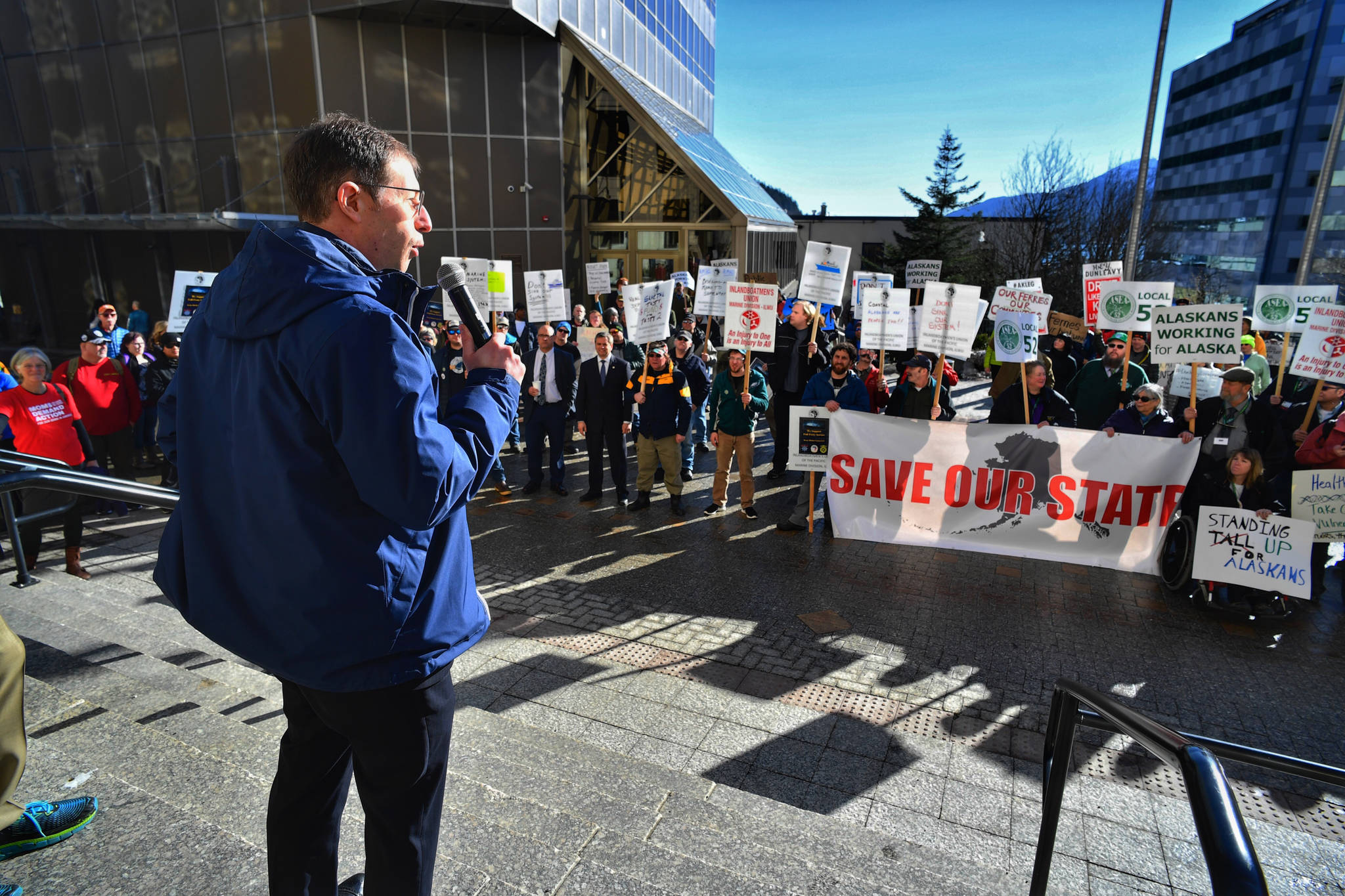 Sen. Jessee Kiehl, D-Juneau, speaks during a rally oof state union workers in front of the Capitol on Wednesday, Feb. 27, 2019. (Michael Penn ι Juneau Empire)