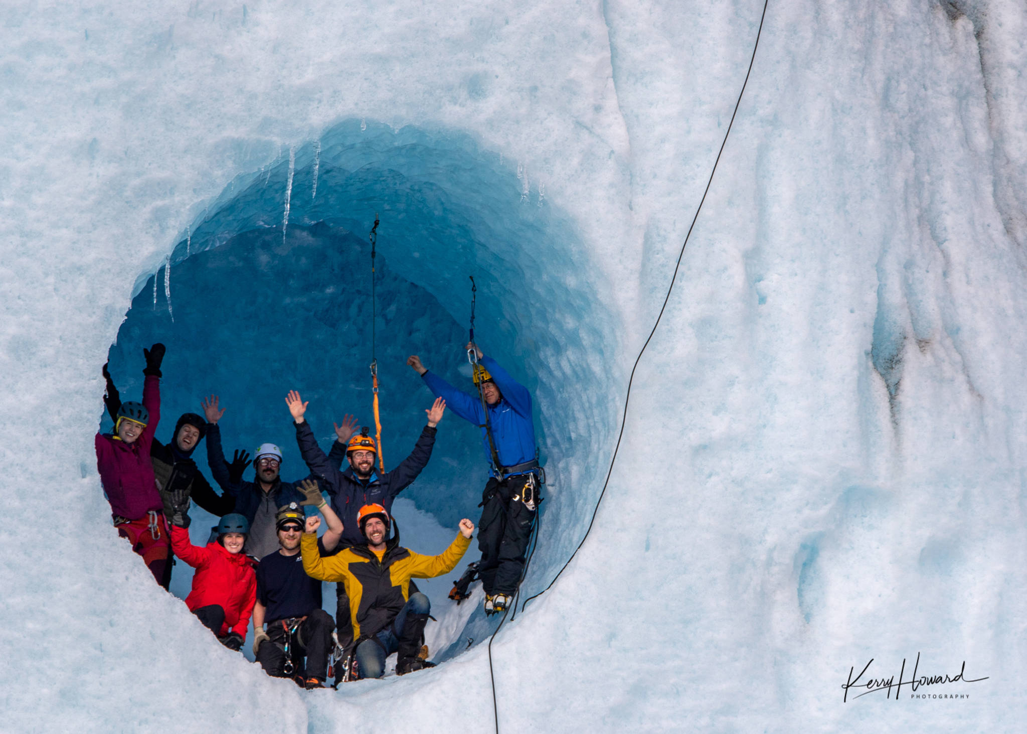 Local climbers descend into the blue moulin on the face of the Mendenhall Glacier on March 9, 2019. (Courtesy Photo | Kerry Howard)