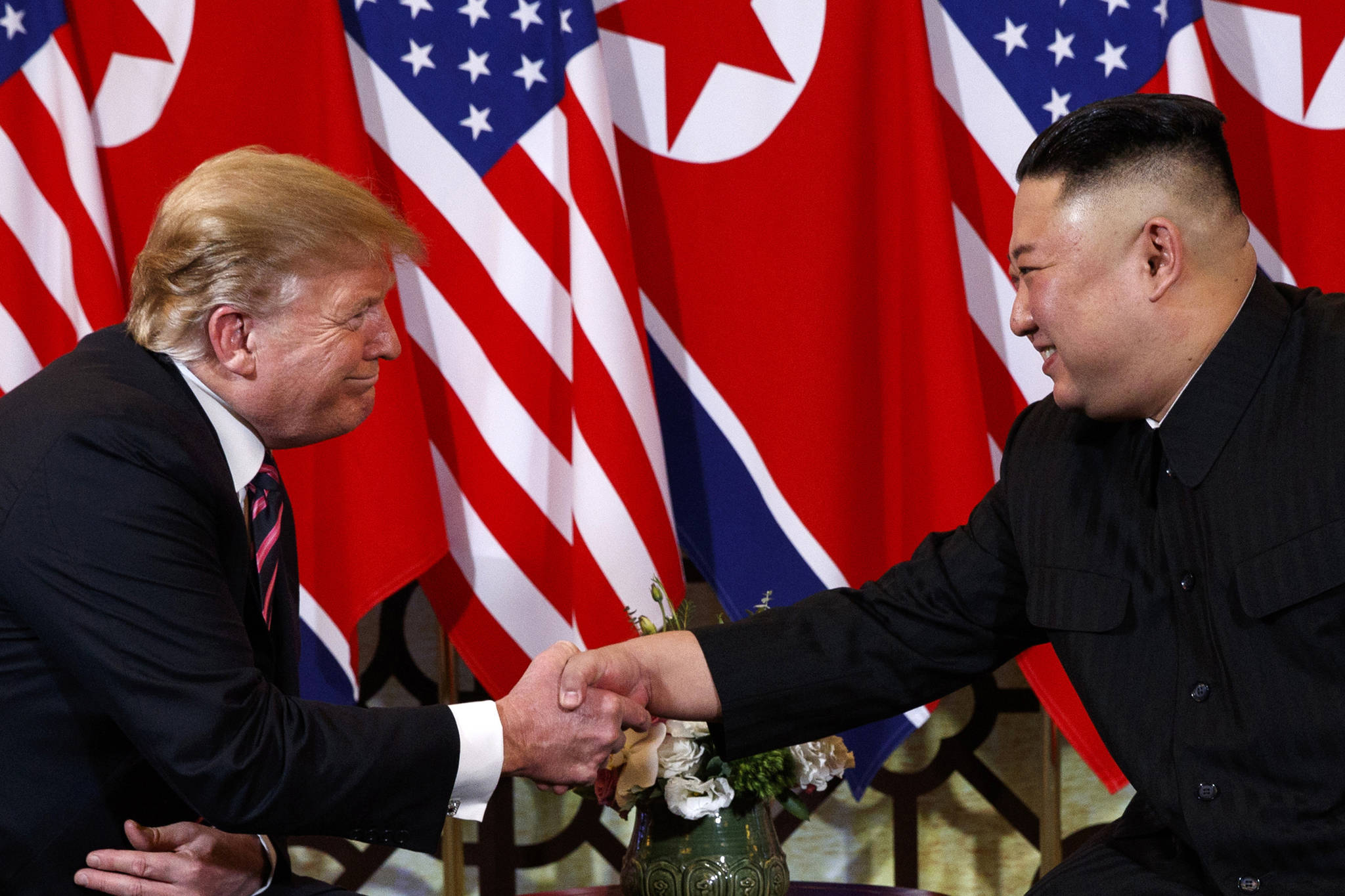 In this Feb. 27, 2019 photo, U.S. President Donald Trump shakes hands with North Korean leader Kim Jong Un in Hanoi. (Evan Vucci | Associated Press File)