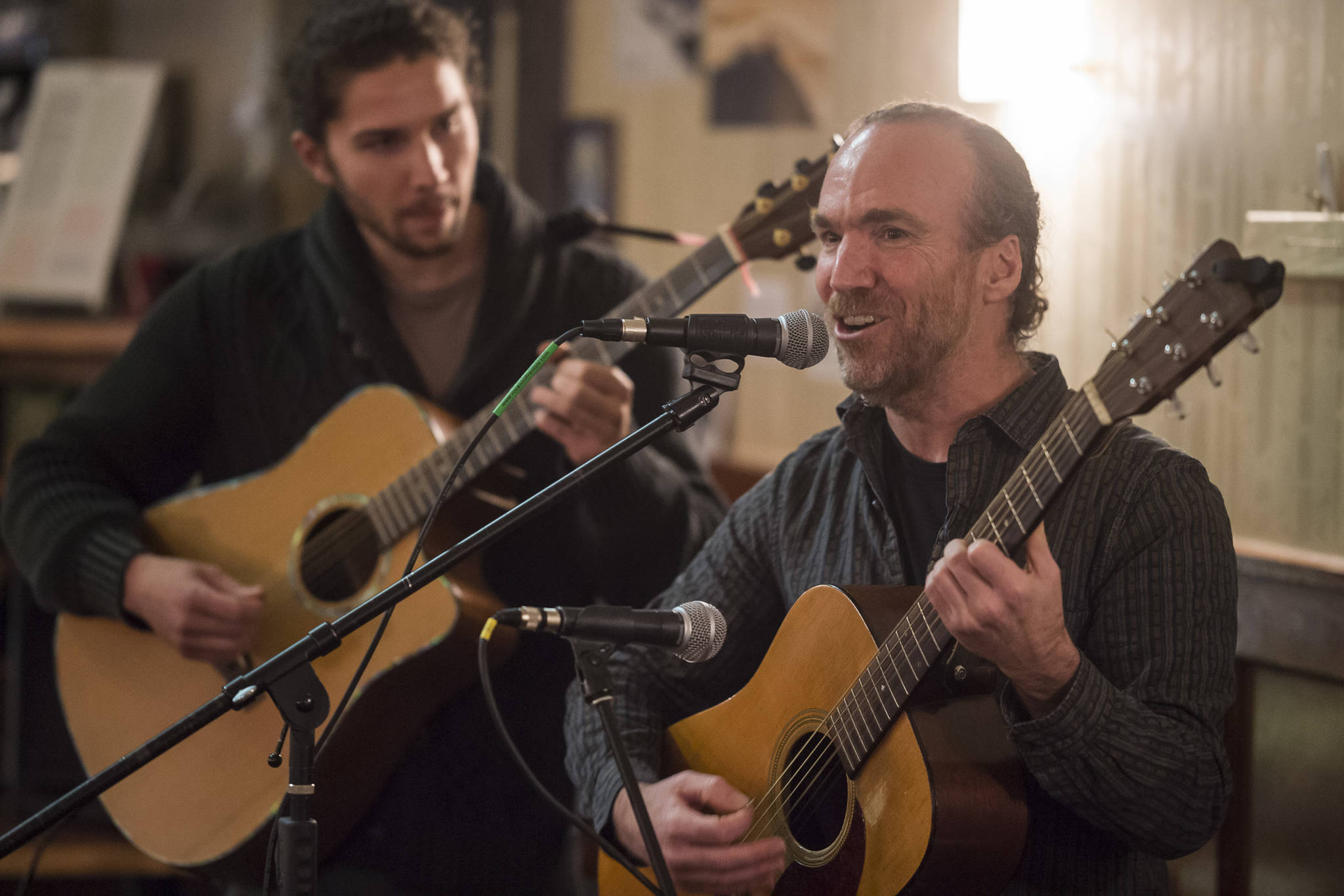 Dave Albert, right, is backed up by Avery Stewart during his two-song set at the Mountainside Open Mic & Art Night at The Rookery on Oct. 31, 2018. (Michael Penn | Capital City Weekly File)