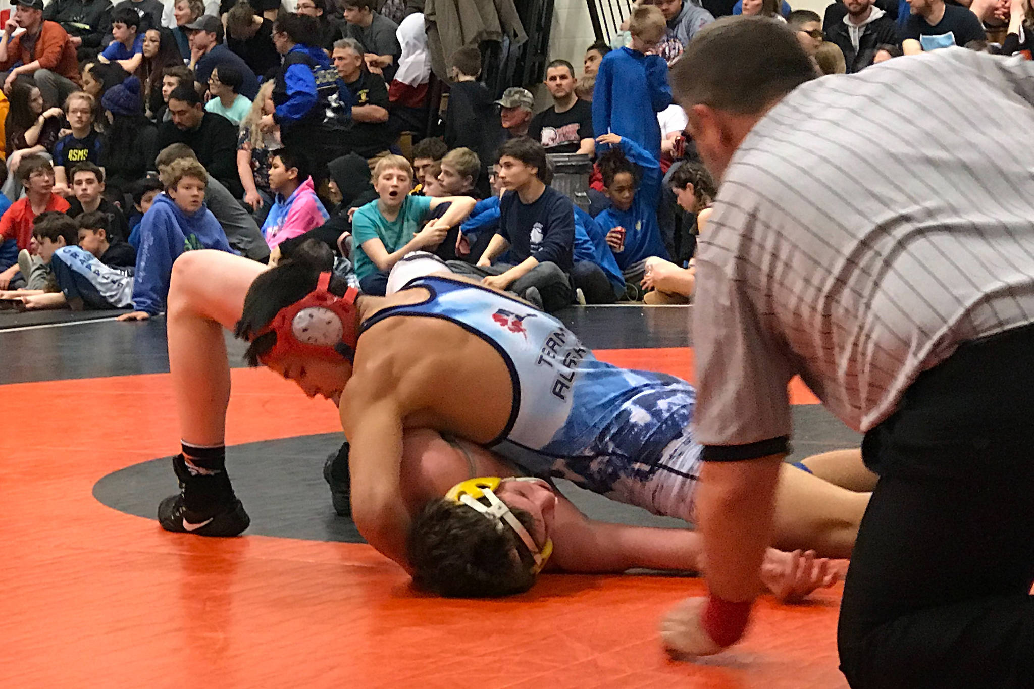 Juneau Tornadoes eighth-grader Jamal Johnson wrestles his way to the 140-pound championship at the Tanana Invitational on Saturday, March 2, 2019. Over 400 wrestlers competed at the two-day meet in Fairbanks. (Courtesy Photo | Summer Baxter/Dana Richards)