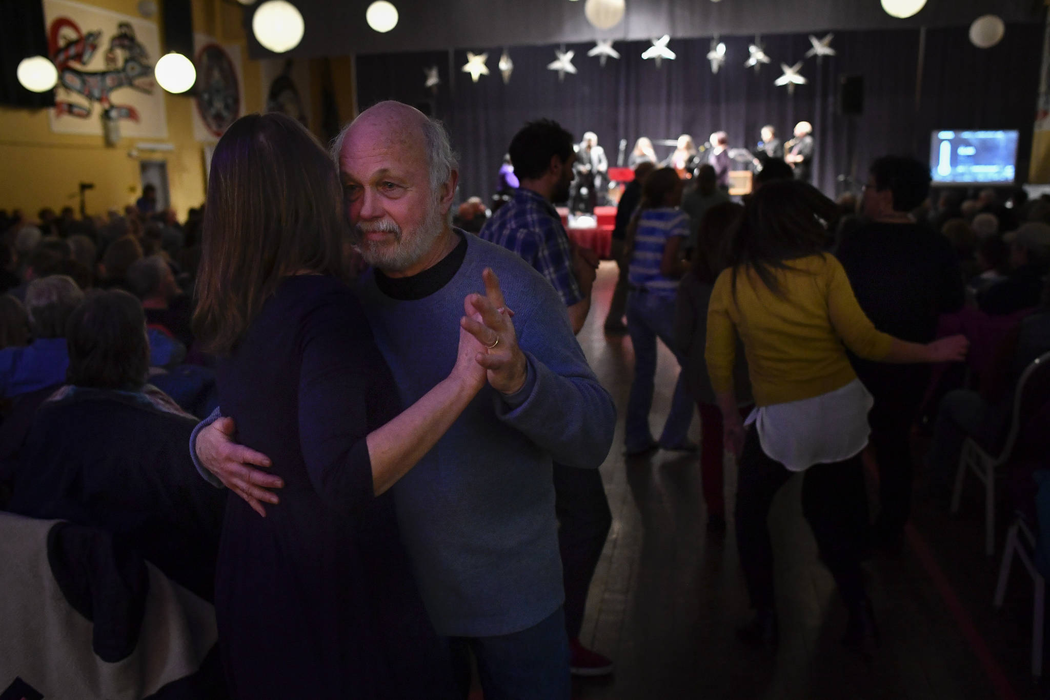 Jim Fowler dances with his wife Susi during the performance of “Motown for Our Town” featuring Ryan Shaw, Bobby Lewis, Eustace Johnson, Jaunelle Celaire and others at the Juneau Arts & Culture Center on Friday, March 1, 2019. (Michael Penn | Juneau Empire)