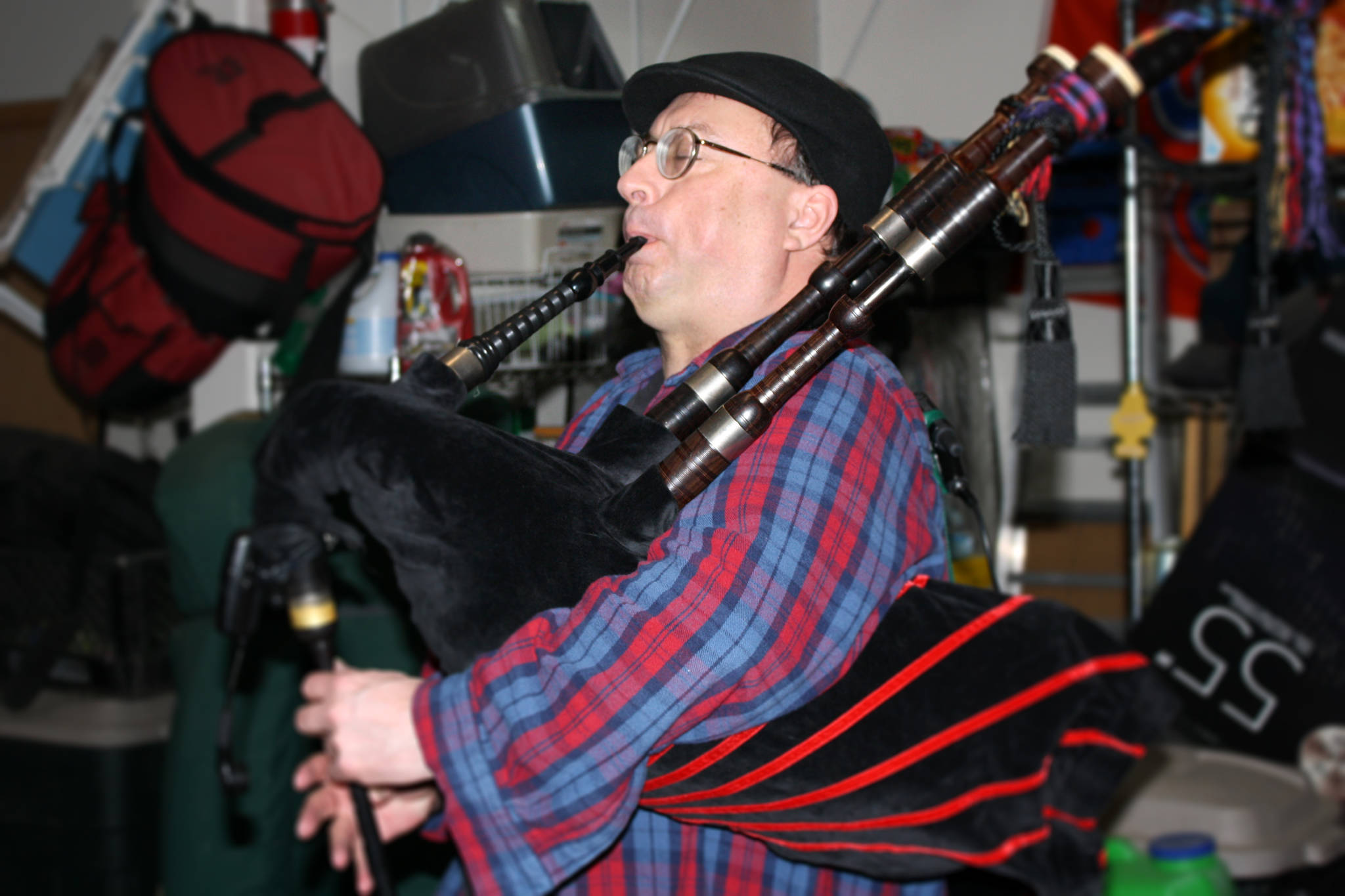 Mike Barnhill plays bagpipes during a Fire on McGinnis practice Saturday, March 9, 2019. (Ben Hohenstatt | Capital City Weekly)