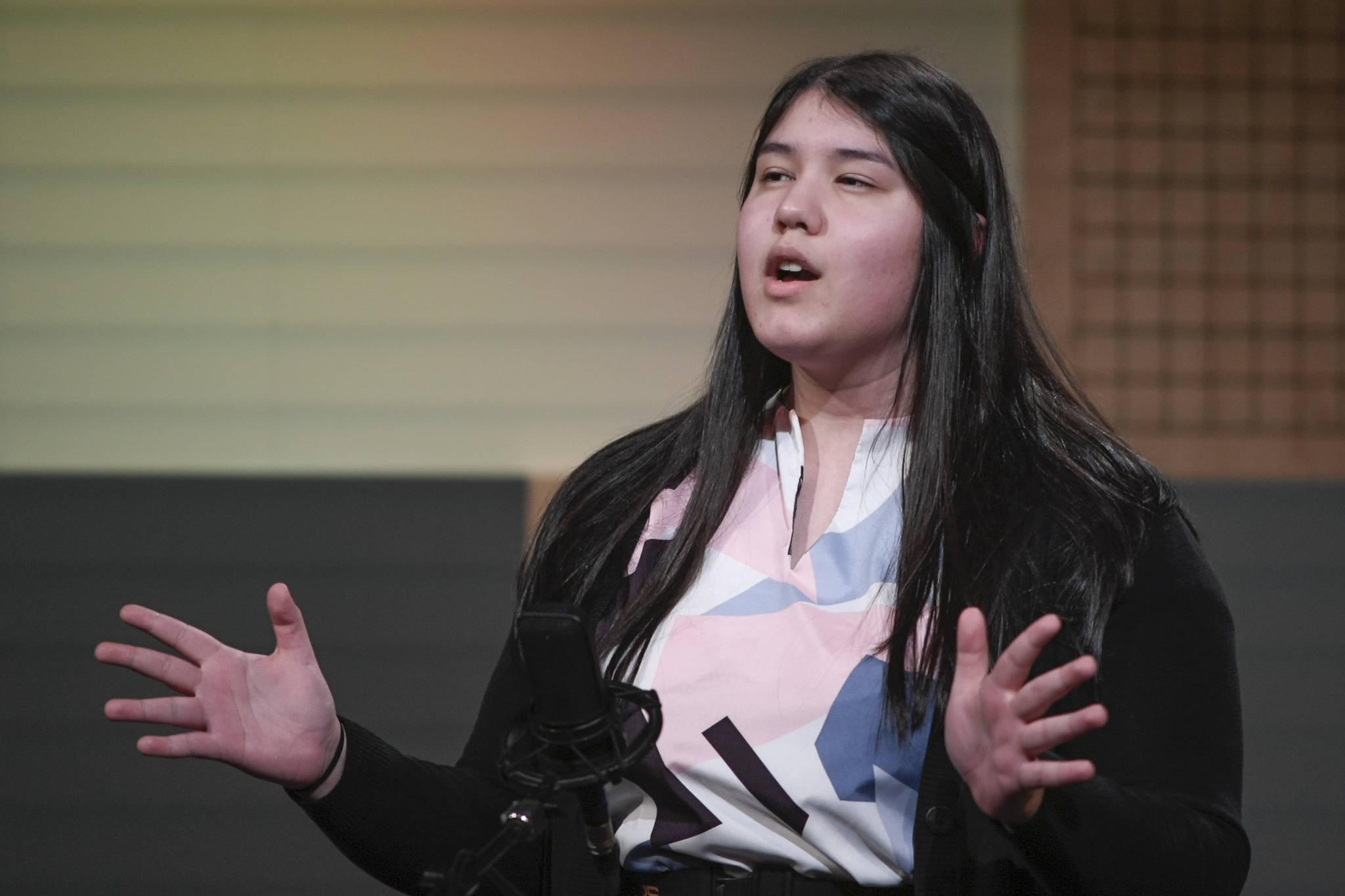 Avery Herrman-Sakamoto of Petersburg High School recites one of her three poems at the annual Poetry Out Loud State Championships held at KTOO’s @360 Studio on Thursday, March 7, 2019. (Michael Penn | Juneau Empire)