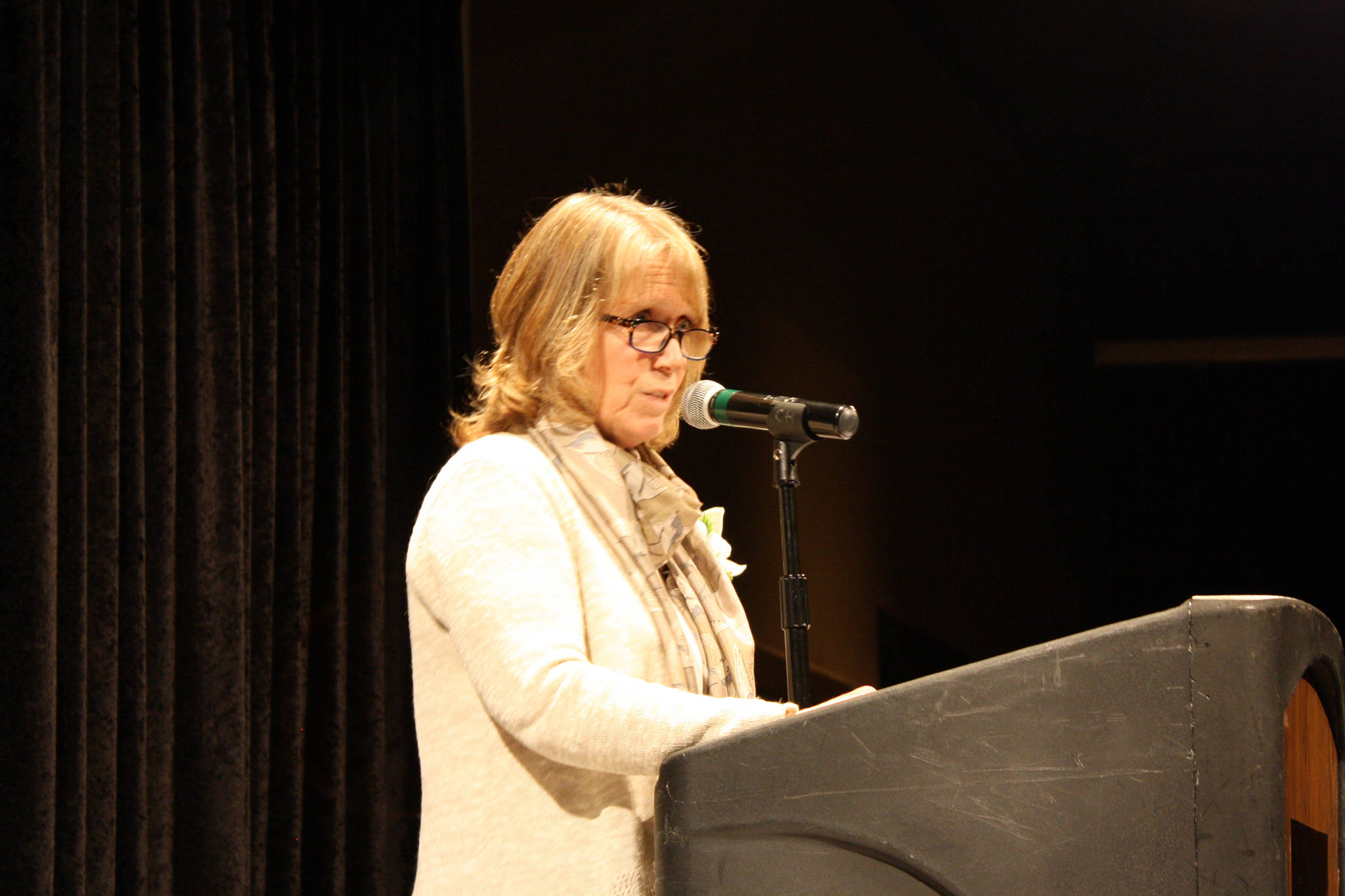 Janine Reep speaks during the Woman of Distinction 2019 Celebration Saturday, March 9, 2019 at Centennial Hall. During her speech she focused on the reality that the circumstances of one’s birth has a drastic impact on their life and the honor of being a “Woman of Disruption.” (Ben Hohenstatt | Capital City Weekly)