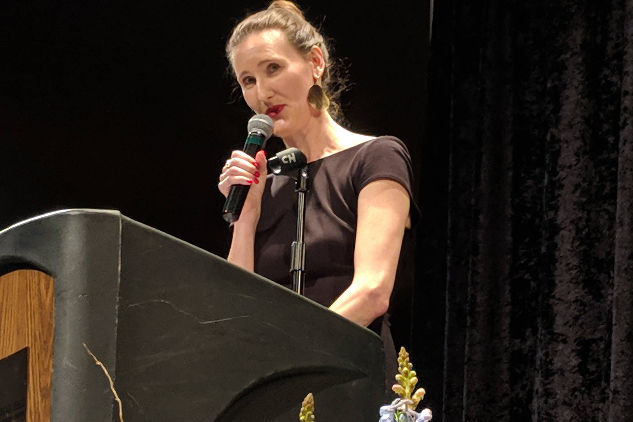 Jorden Nigro speaks during the Woman of Distinction 2019 Celebration Saturday, March 9, 2019 at Centennial Hall. During her speech she advocated for seeing humanity in others and the value of showing up. (Ben Hohenstatt | Capital City Weekly)