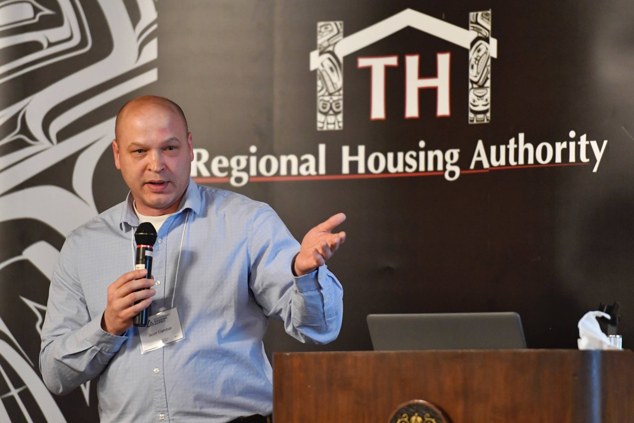 Scott Ciambor, chief housing gfficer for the City and Borough of Juneau and board chair for the Alaska Coalition on Housing and Homelessness, speaks at the Southeast Housing Summit at the Baranof Hotel on Wednesday, March 13, 2019. The summit is a two-day program organized by the Tlingit and Haida Regional Housing Authority. (Michael Penn | Juneau Empire)