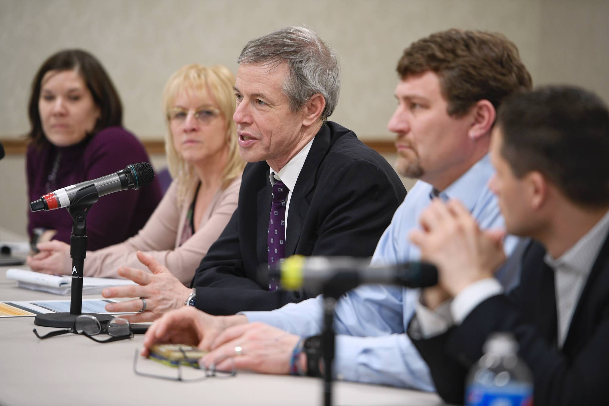 Rep. Matt Claman, D-Anchorage, center, speaks from a panel of the Alaska Criminal Justice Commission during a listening session at Elizabeth Peratrovich Hall on Thursday, Jan. 24, 2019. (Michael Penn | Juneau Empire)