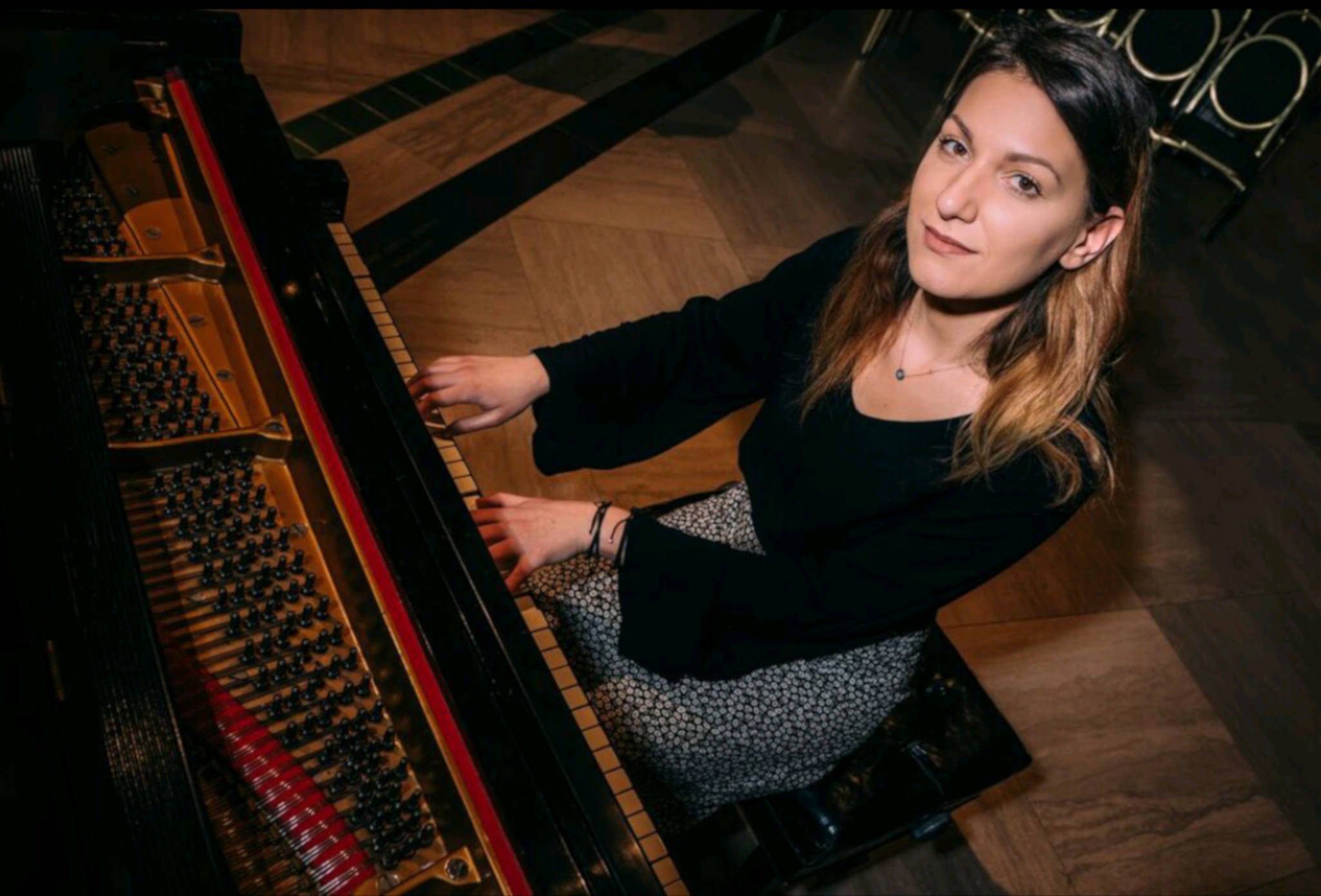 Ioanna Nikou, who will play in Juneau Friday, plays piano. (Courtesy Photo | Ievgeniia Andrusiak)