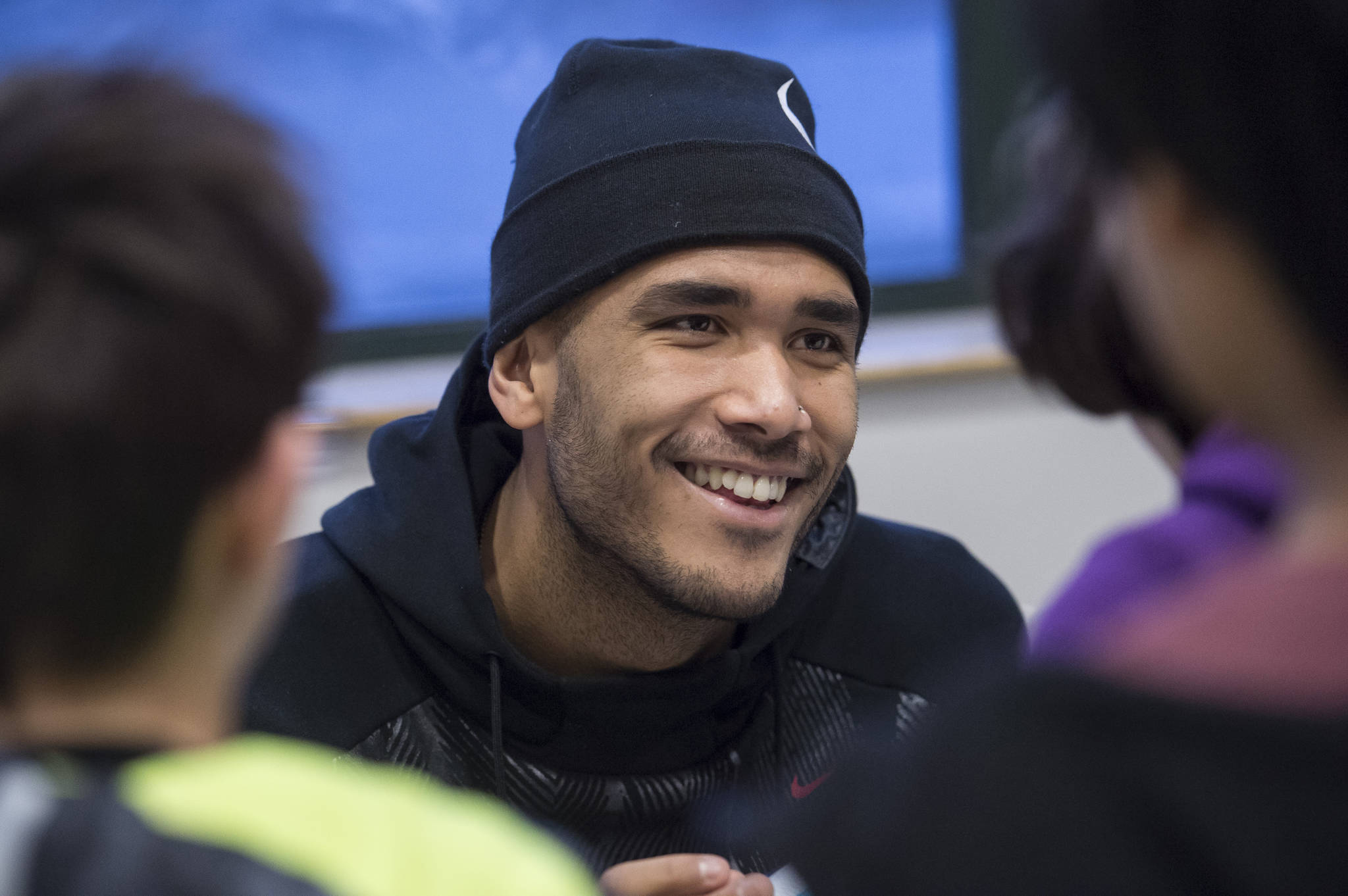 Professional basketball player Damen Bell-Holter, a Haida from Hydaburg, visits sixth-graders at Dzantik’i Heeni Middle School to give an inspirational speech on Friday, Dec. 8, 2017. Bell-Holter is leading up a basketball and leadership gathering this week at Thunder Mountain High School and Elizabeth Peratrovich Hall. (Michael Penn | Juneau Empire File)